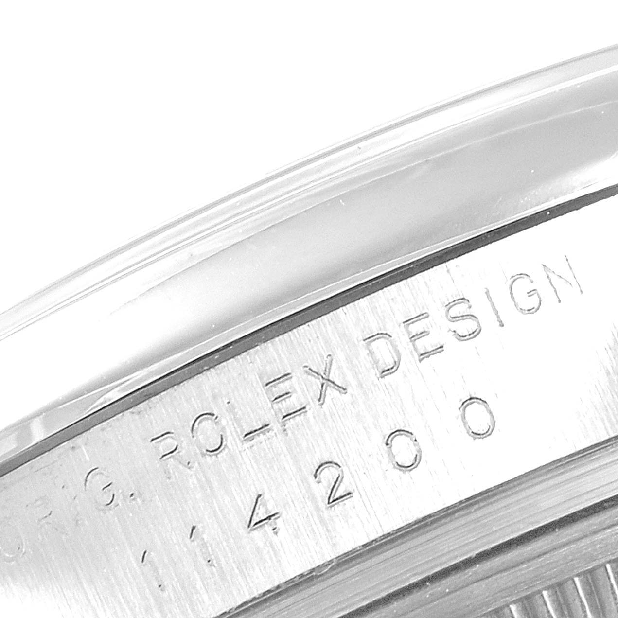 This image shows a close-up angle of the case side with engraved details of a Rolex Air-King 114200 Men's Stainless Steel Silver Dial 114200 Men's Stainless Steel Silver Dial watch.
