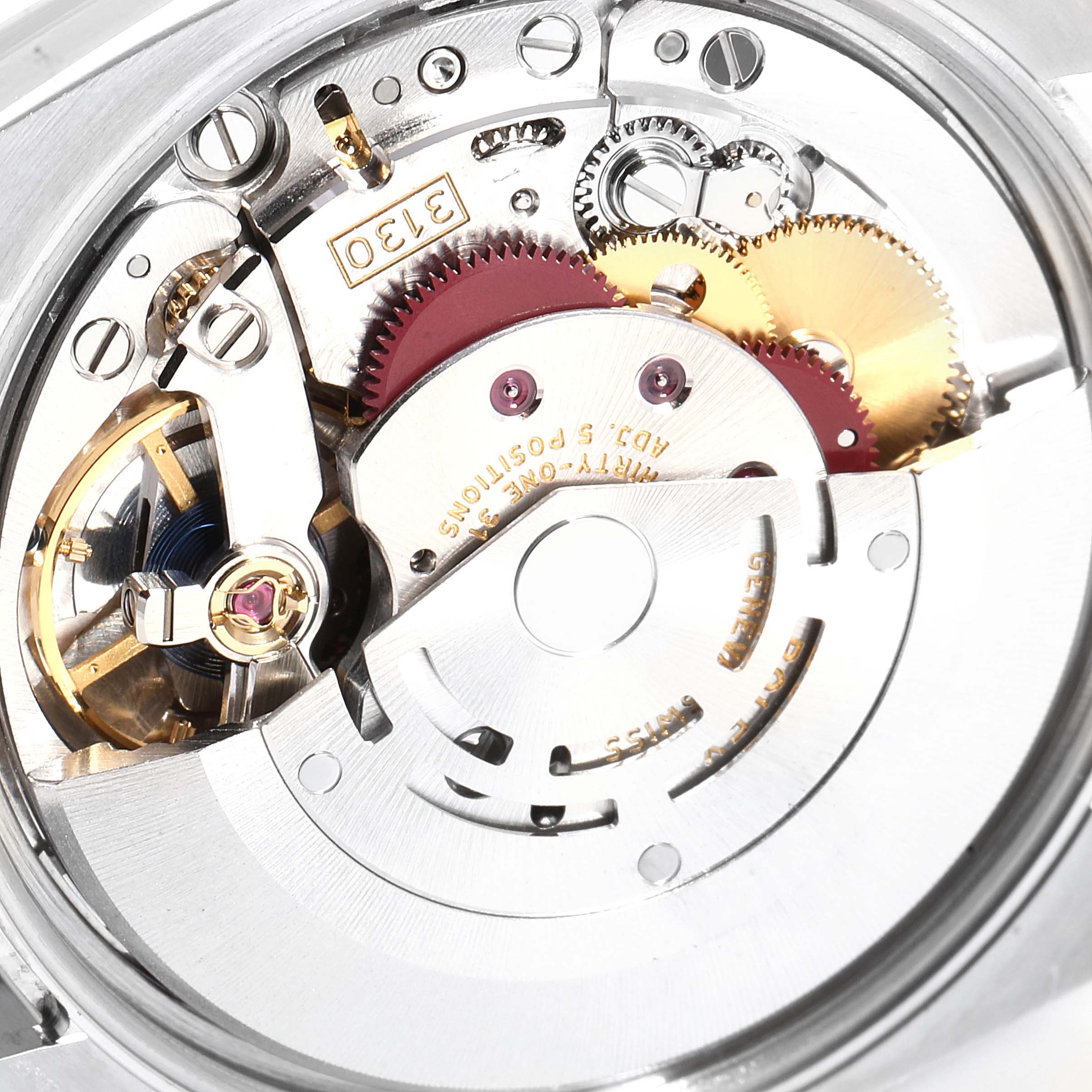 This image shows the intricate internal mechanism of an Rolex Air-King 114200 Men's Stainless Steel Silver Dial 114200 Men's Stainless Steel Silver Dial watch, featuring gears and the rotor.