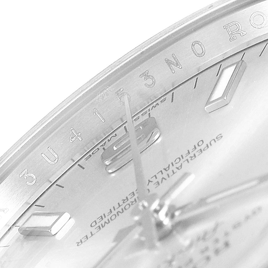 This close-up image shows part of the dial and bezel, including numerals and minute markers, of a Rolex Air-King 114200 Men's Stainless Steel Silver Dial 114200 Men's Stainless Steel Silver Dial watch.