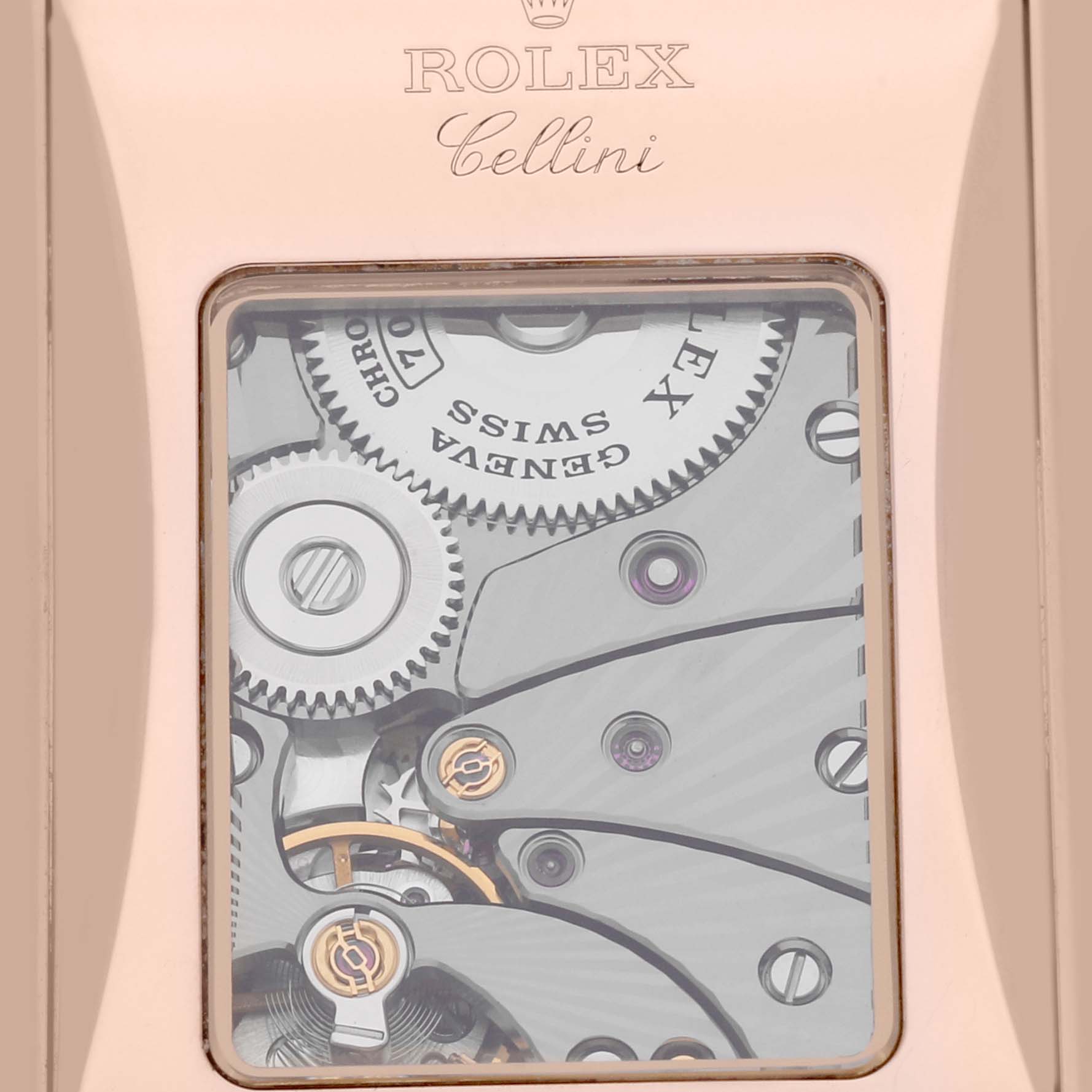 This image shows a close-up of the movement mechanism of a Rolex Cellini 5442/5 Men's Rose Gold Black Dial 5442/5 Men's Rose Gold Black Dial watch, focusing on the intricate gears and components.