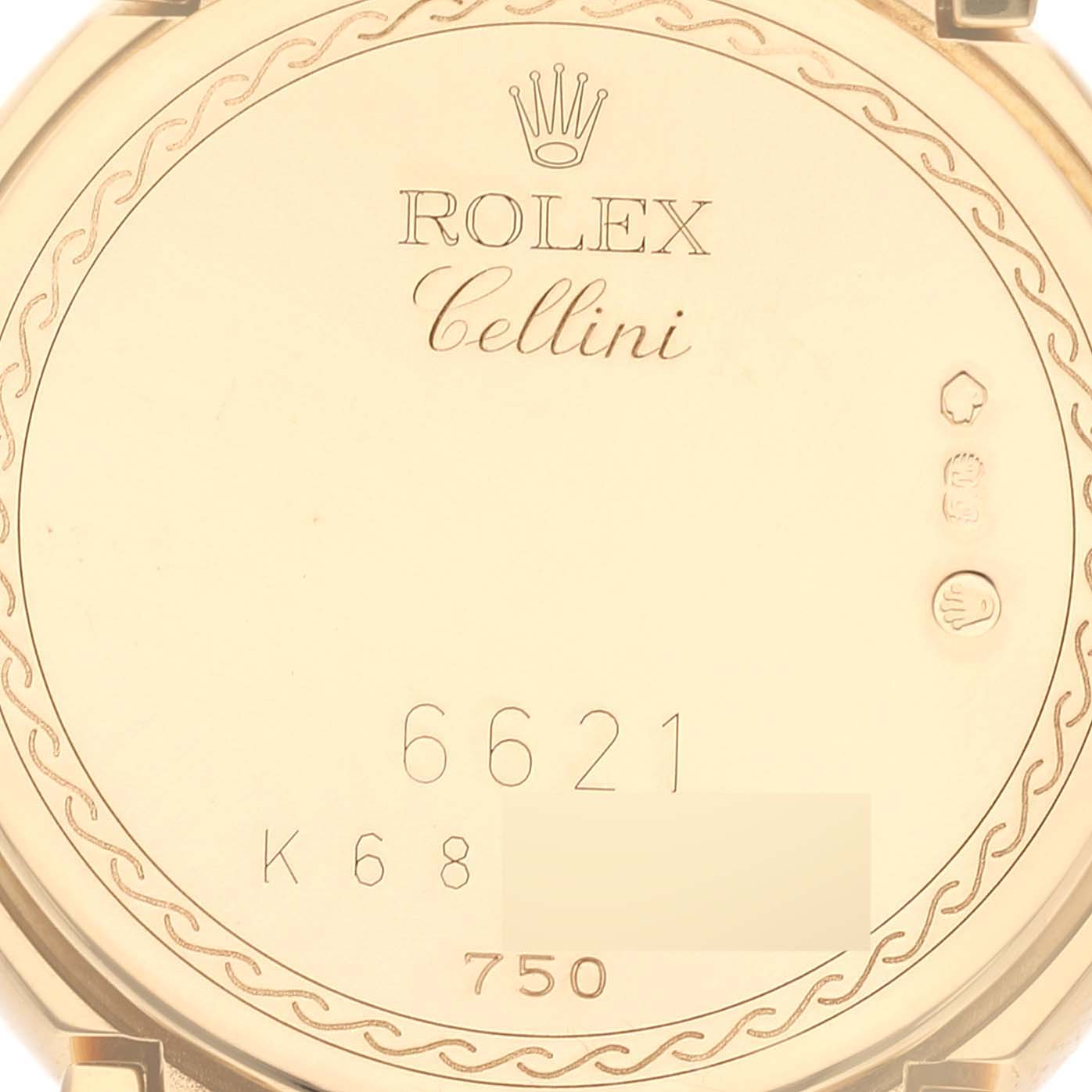 This image shows the back case of a Rolex Cellini 6621 Women's Yellow Gold White Dial 6621 Women's Yellow Gold White Dial model, highlighting the brand name, model name, and some engravings.