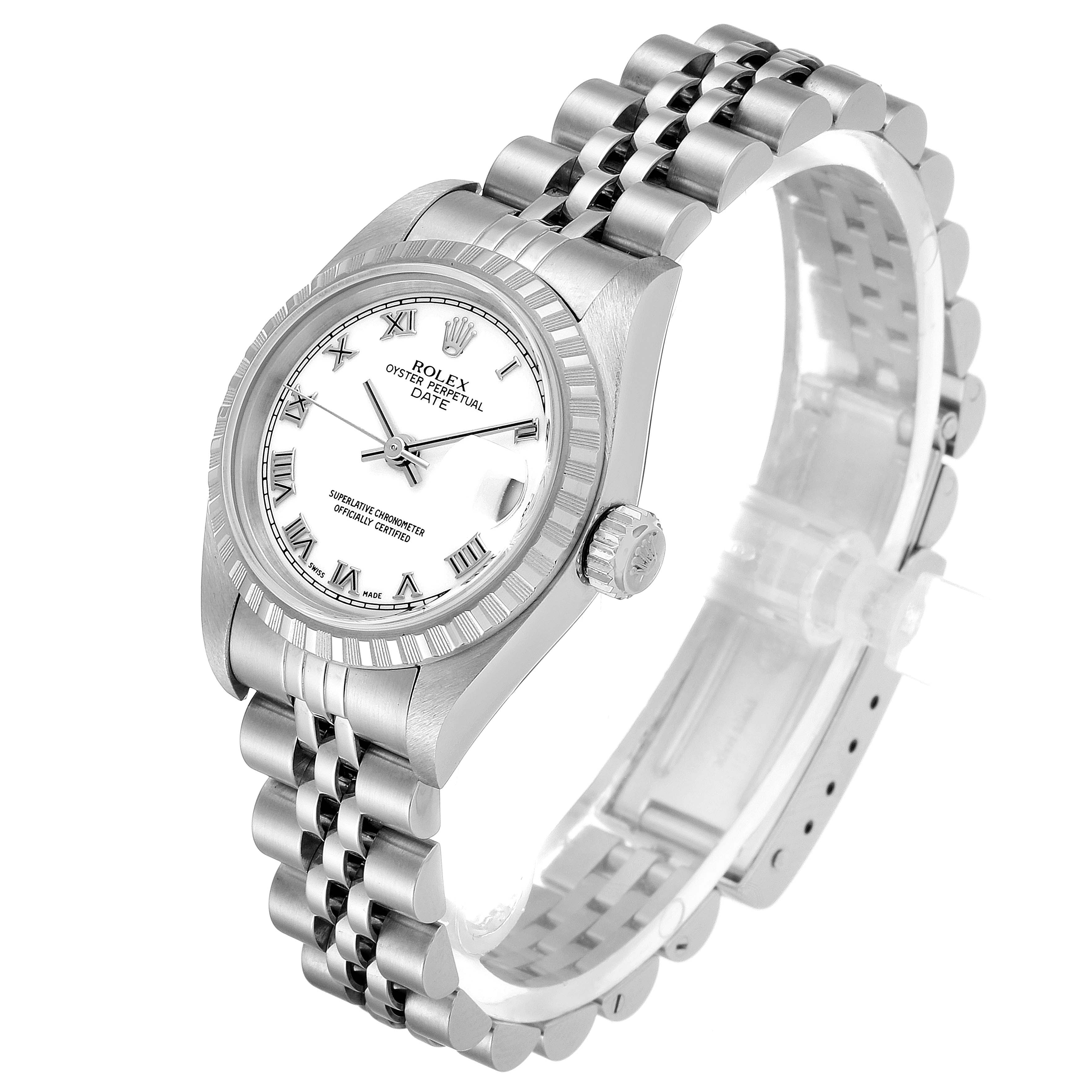 The image shows a side view of a Rolex Datejust 79240 Women's Stainless Steel White Dial 79240 Women's Stainless Steel White Dial watch, highlighting its white dial, Roman numerals, and metallic bracelet.