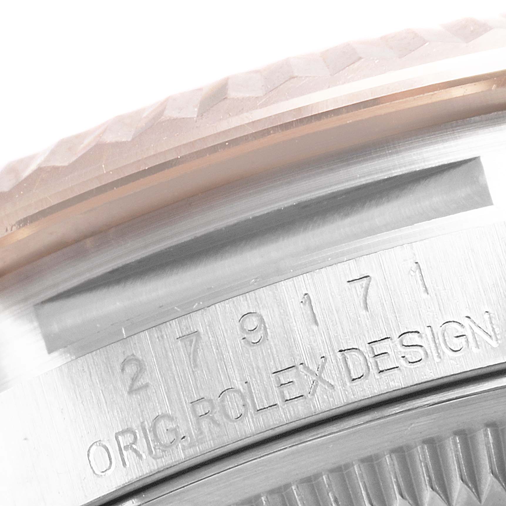 The image shows a close-up of the serial number and part of the bezel of a Rolex Datejust 279171 Women
s Stainless Steel White Dial 279171 Women
s Stainless Steel White Dial watch.