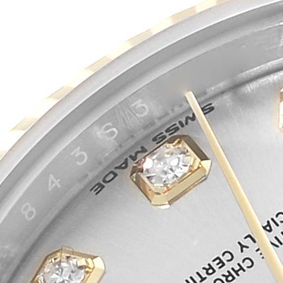 The image shows a close-up of the dial and bezel of a Rolex Datejust 279173 Women's Steel and Gold (two tone) Silver Dial 279173 Women's Steel and Gold (two tone) Silver Dial watch, highlighting the diamond hour markers and part of the text.