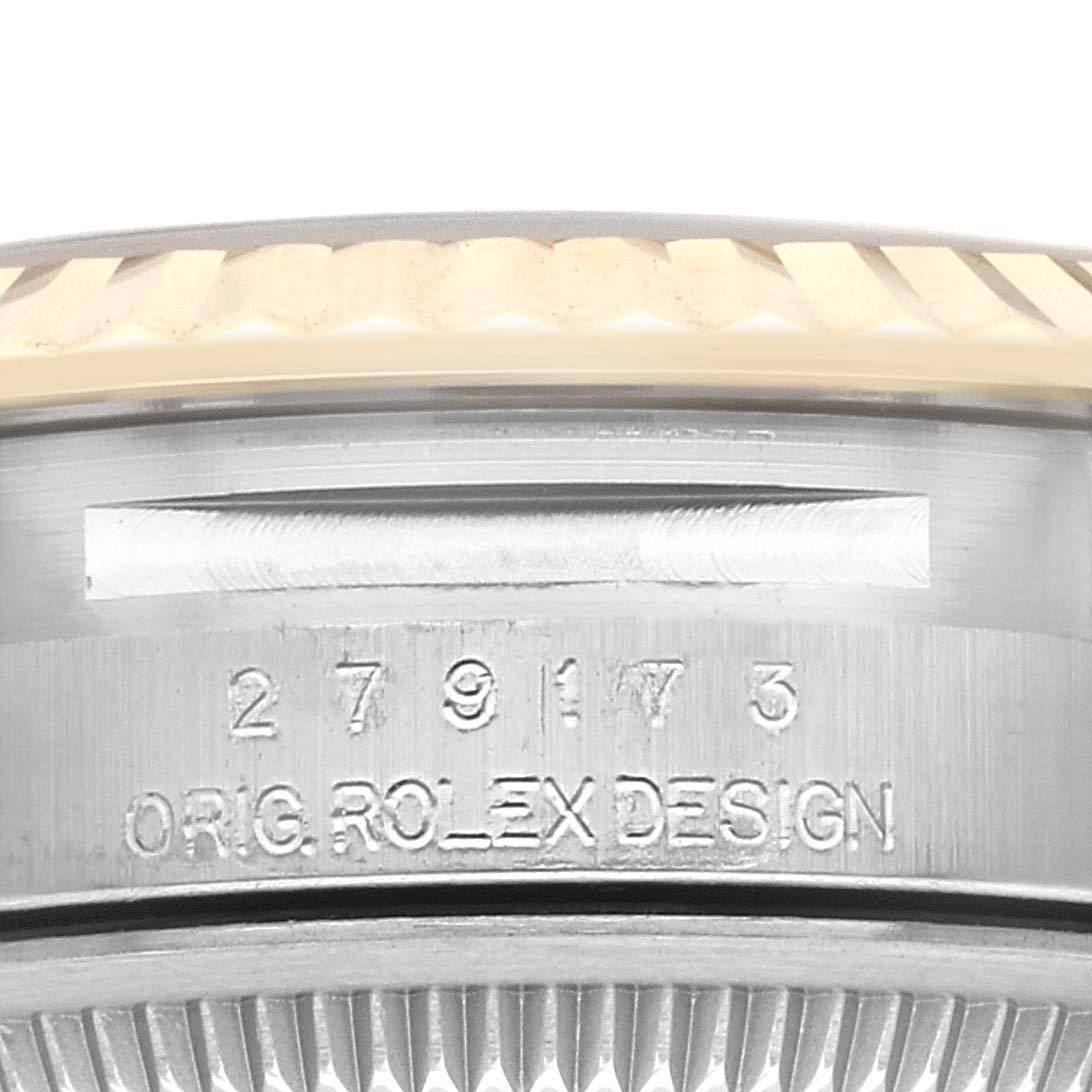 The image displays a close-up of the side case of a Rolex Datejust 279173 Women's Steel and Gold (two tone) Silver Dial 279173 Women's Steel and Gold (two tone) Silver Dial, showing its serial number and "ORIG. ROLEX DESIGN" engraving.