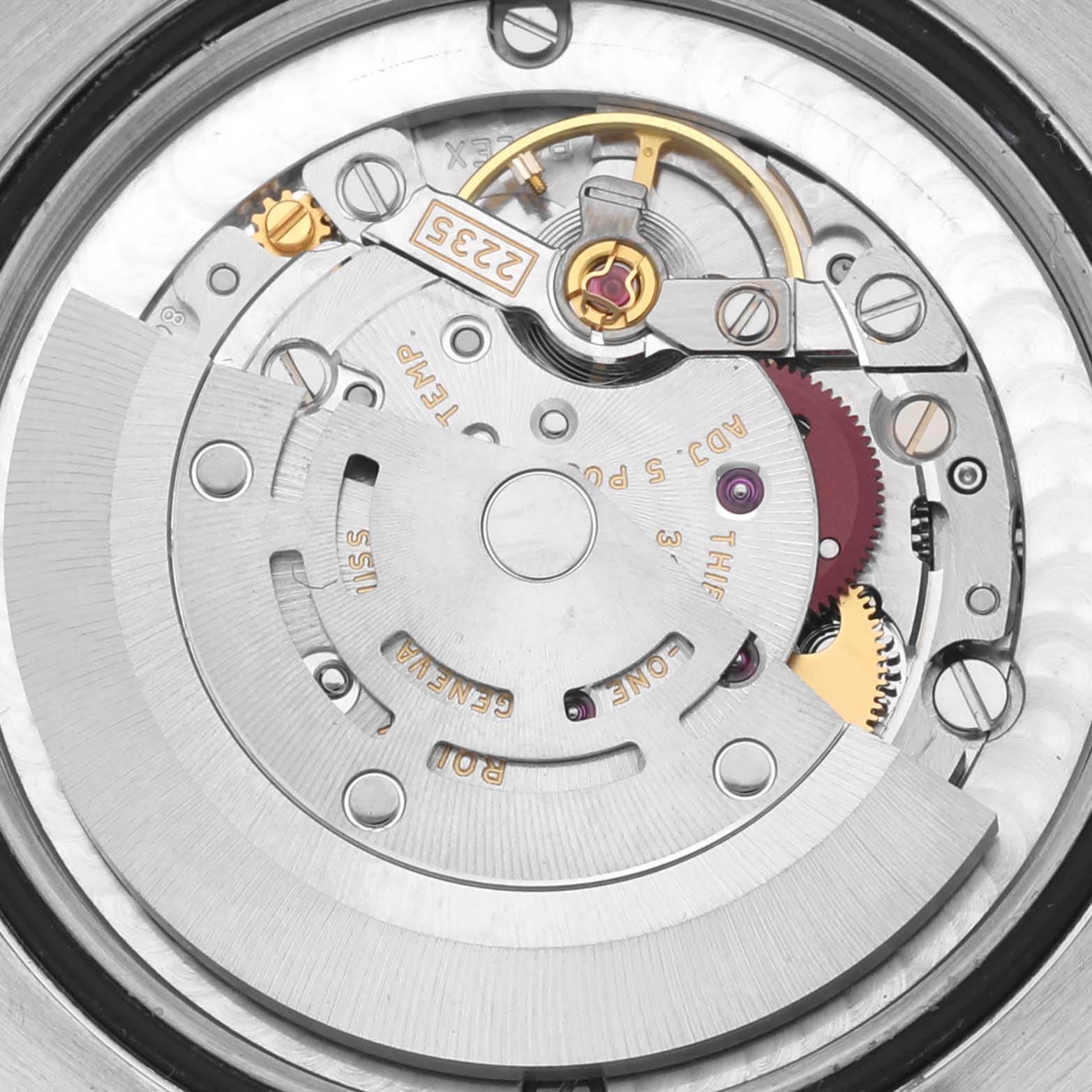 The image shows the internal mechanism and movement parts of a Rolex Mid-Size 178343 Women
s Steel and Gold (two tone) Mother of Pearl Dial 178343 Women
s Steel and Gold (two tone) Mother of Pearl Dial watch from a top-down angle.