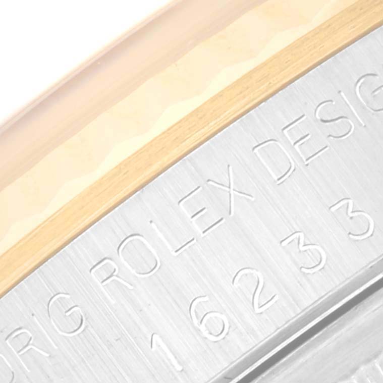 This close-up image shows the caseback engraving on a Rolex Datejust 16233 Men's Steel and Gold (two tone) Champagne Dial 16233 Men's Steel and Gold (two tone) Champagne Dial watch.