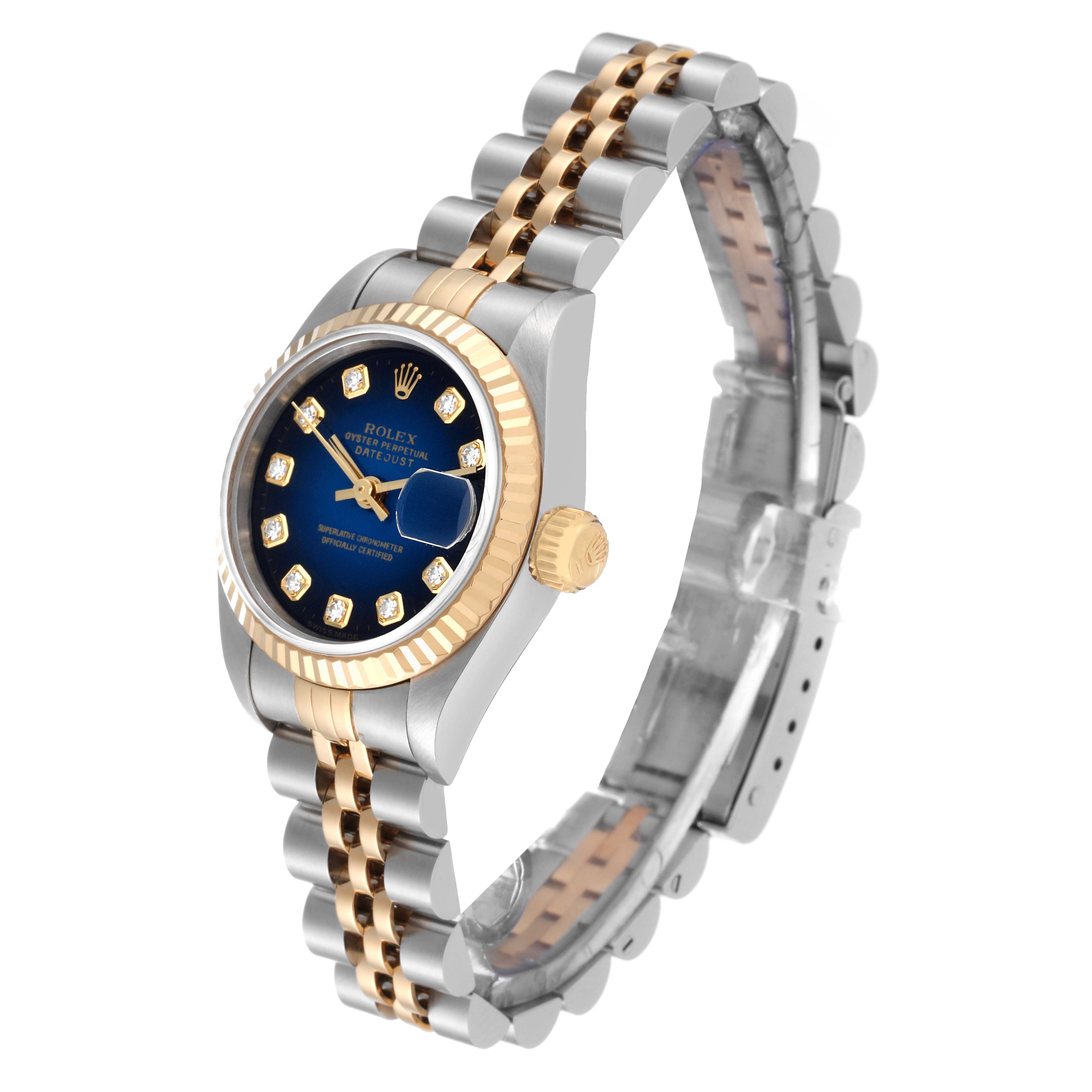 This image shows a Rolex Datejust 69173 Women's Steel and Gold (two tone) Blue Dial 69173 Women's Steel and Gold (two tone) Blue Dial watch at a three-quarter angle, highlighting its two-tone bracelet, blue dial, and fluted bezel.