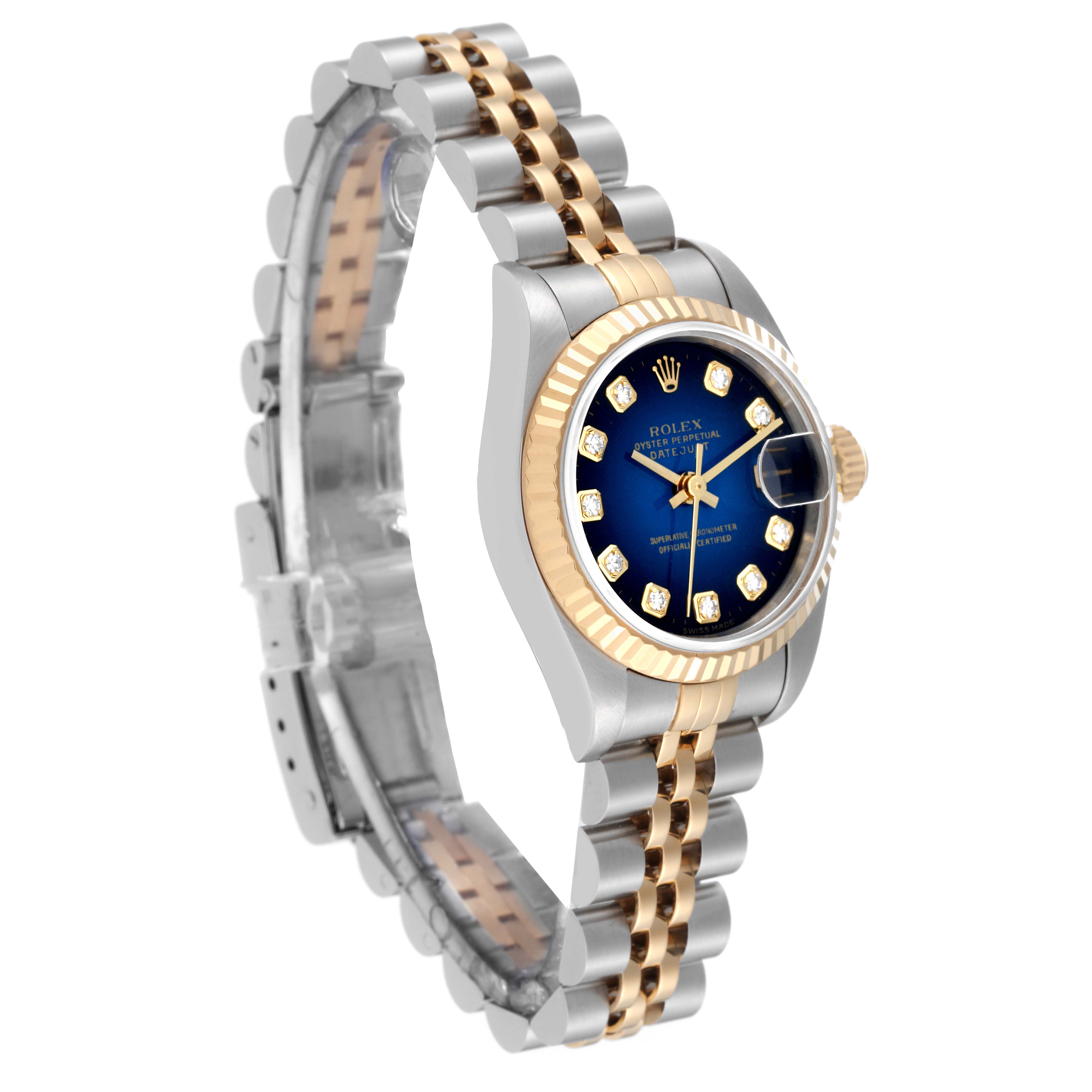 The image shows a Rolex Datejust 69173 Women's Steel and Gold (two tone) Blue Dial 69173 Women's Steel and Gold (two tone) Blue Dial watch from a three-quarter angle, highlighting its two-tone bracelet and blue dial with diamond markers.