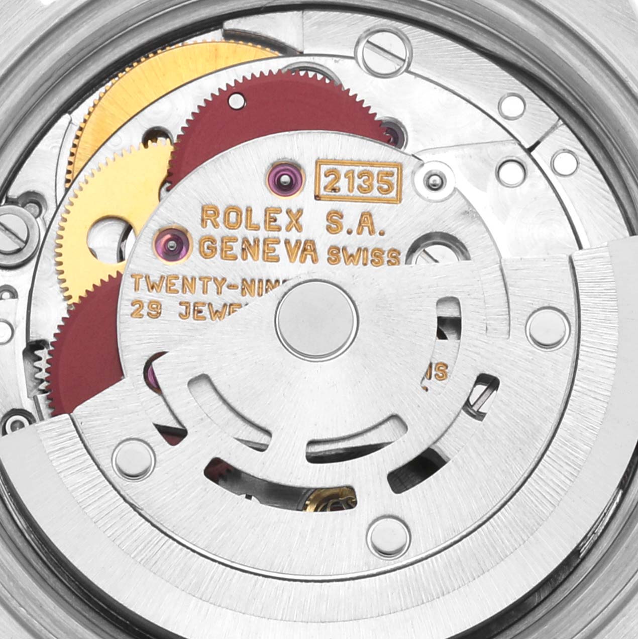 This image shows a close-up of the inner mechanism of a Rolex Datejust 69173 Women's Steel and Gold (two tone) Blue Dial 69173 Women's Steel and Gold (two tone) Blue Dial watch, highlighting the movement and gears.