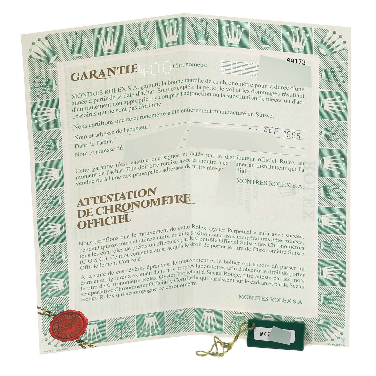 The image shows a Rolex Datejust 69173 Women's Steel and Gold (two tone) Blue Dial 69173 Women's Steel and Gold (two tone) Blue Dial warranty certificate and tag laid out flat.