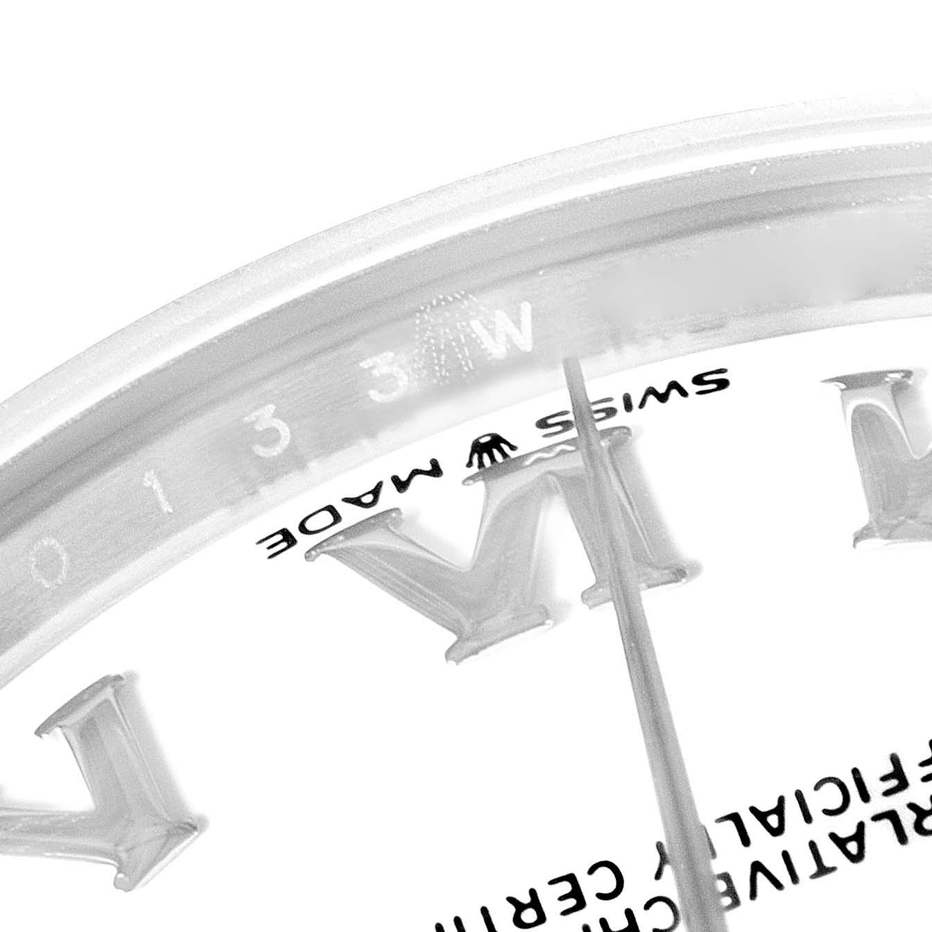 The image shows a close-up of the dial and the edge of a Rolex Mid-Size 278240 Women
s Stainless Steel White Dial 278240 Women
s Stainless Steel White Dial watch, highlighting the "SWISS MADE" marking.
