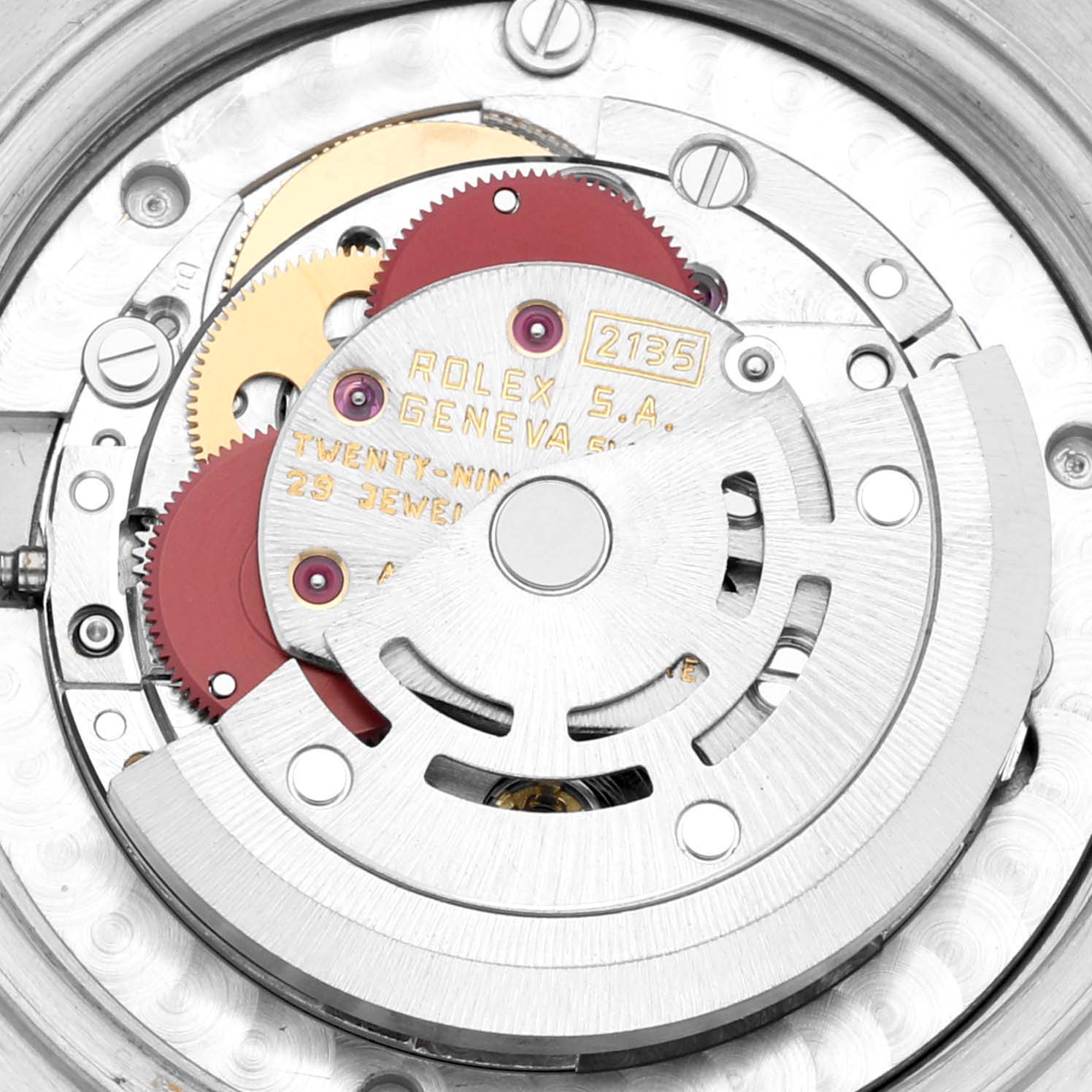 An internal, close-up view of the Rolex Mid-Size 68273 Women's Steel and Gold (two tone) Champagne Dial 68273 Women's Steel and Gold (two tone) Champagne Dial model movement, showing the intricate gears and components.