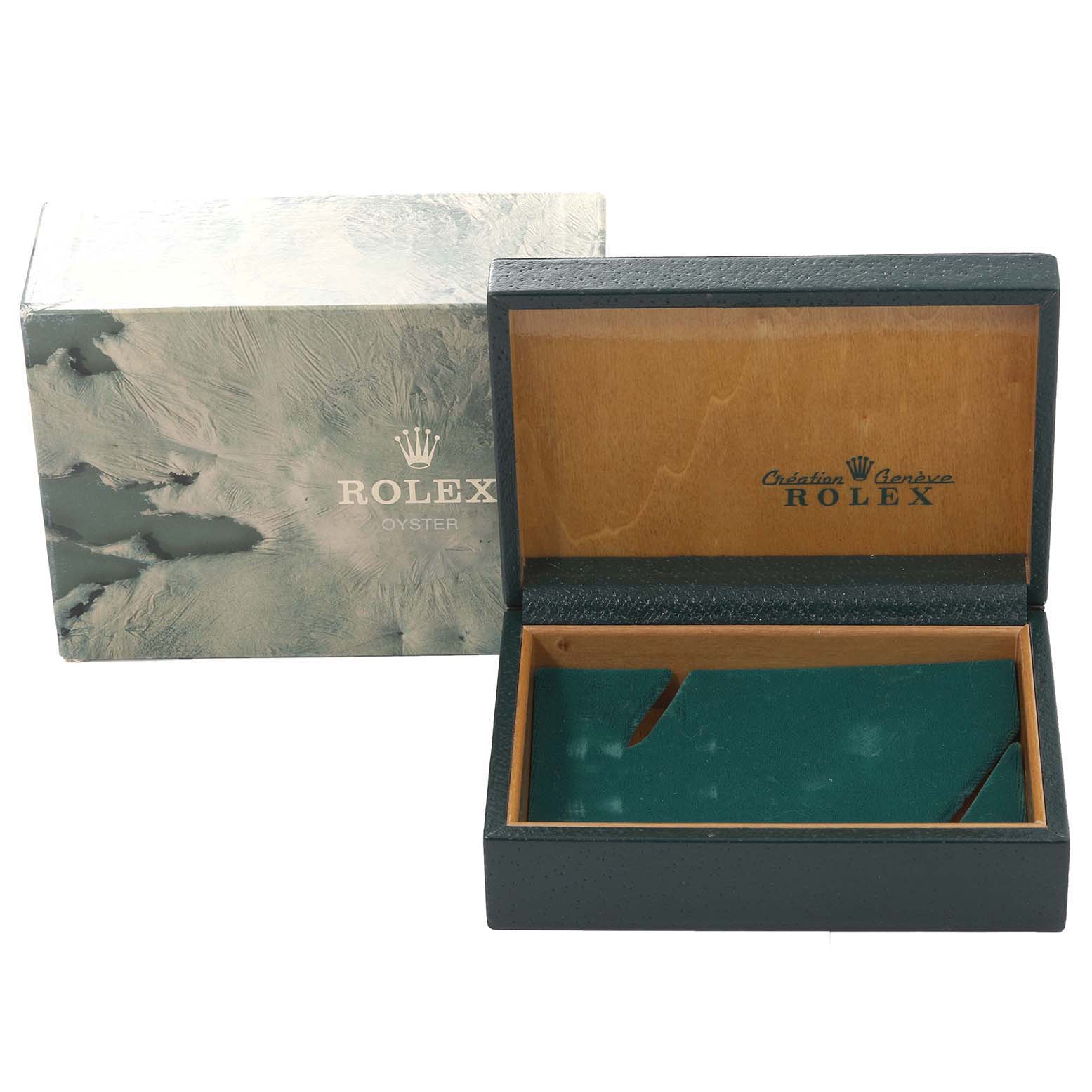 The image shows an open Rolex watch box with its branded outer box for a Mid-Size model.
