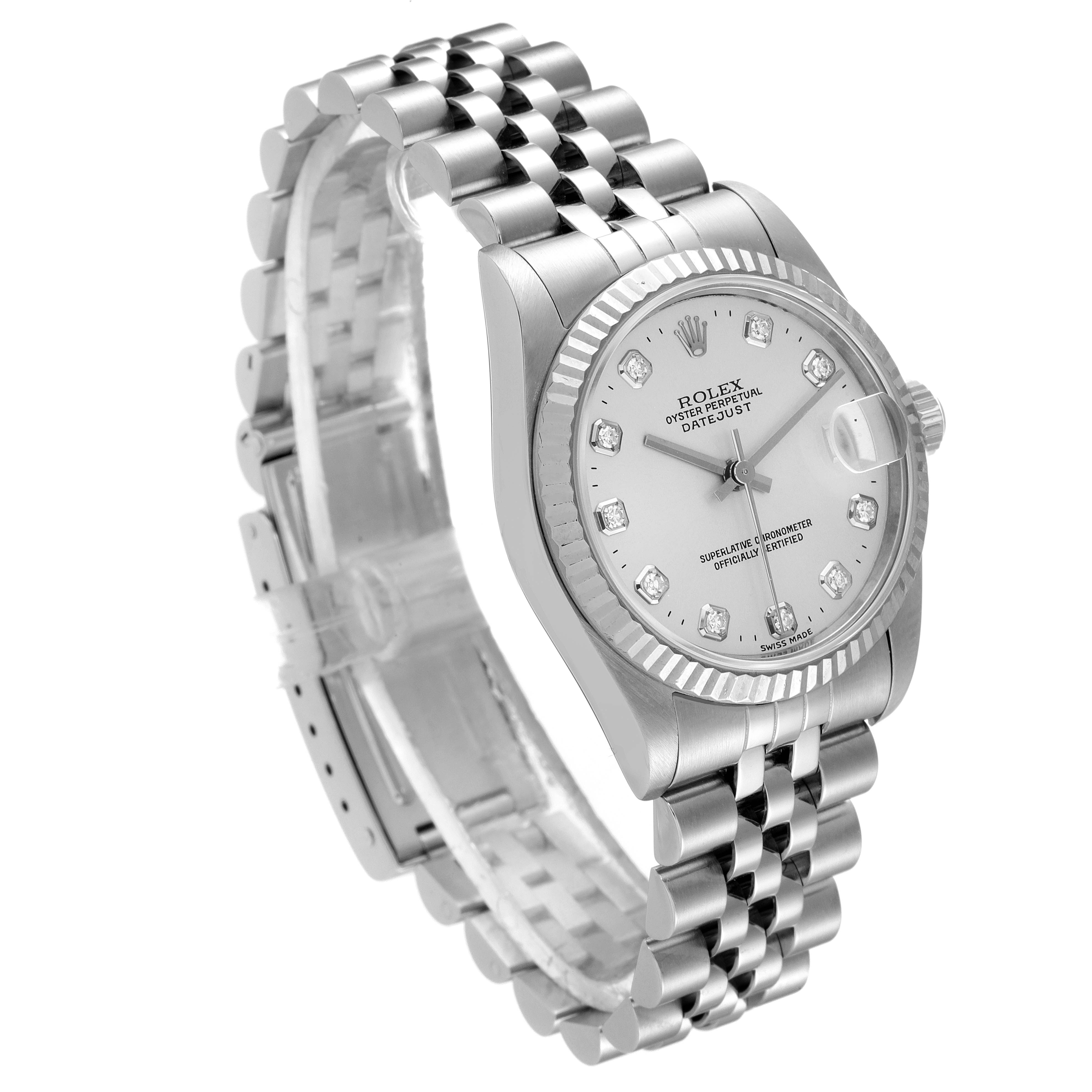 This image shows a Mid-Size Rolex Oyster Perpetual Datejust watch at a three-quarter angle, highlighting the face, bezel, and jubilee bracelet.