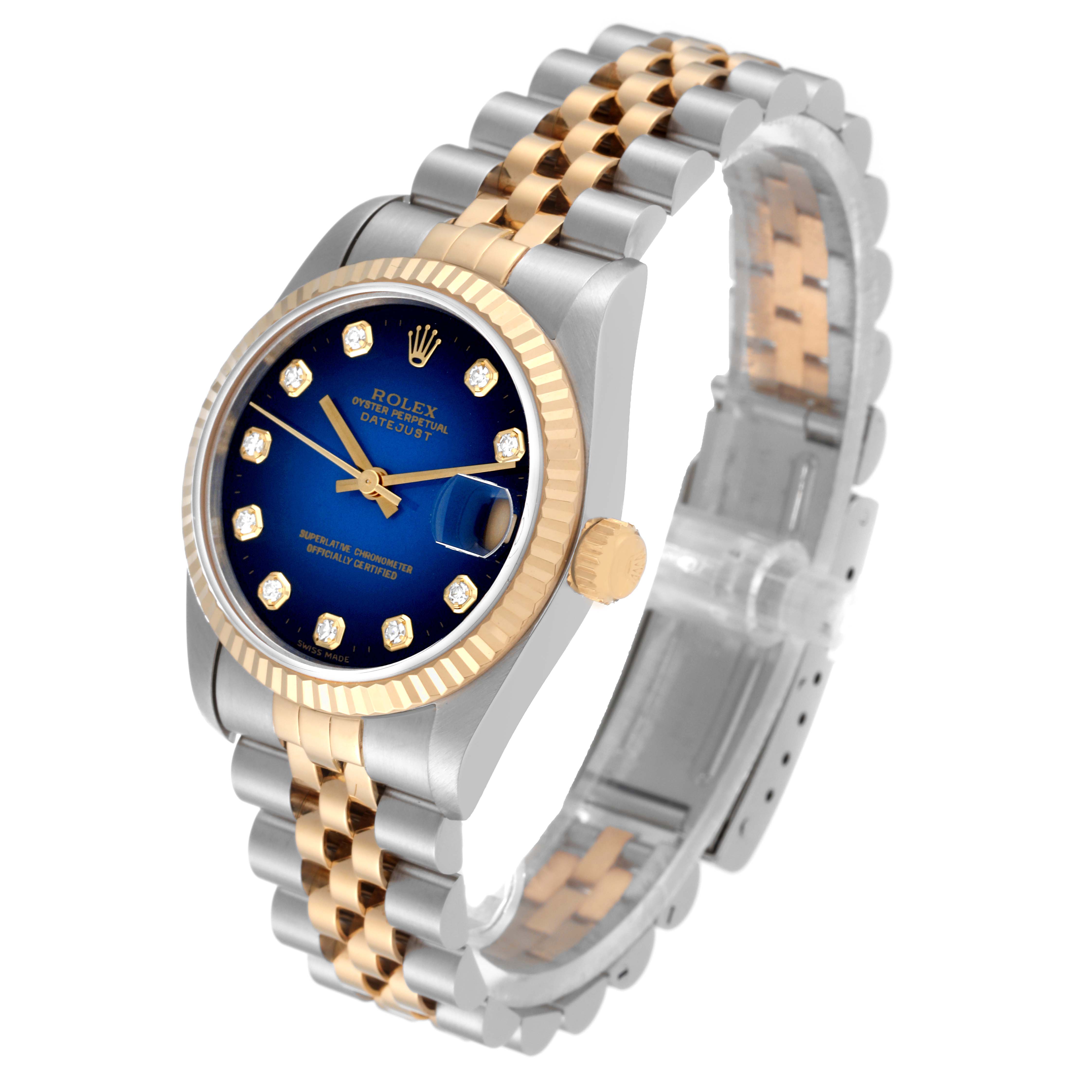 The image shows a mid-size Rolex Datejust watch at an angled view, focusing on the face, bezel, and two-tone bracelet.