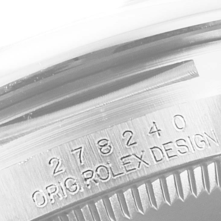 This image shows a close-up of the engraved model number and "ORIG. ROLEX DESIGN" marking on a Mid-Size Rolex watch case.