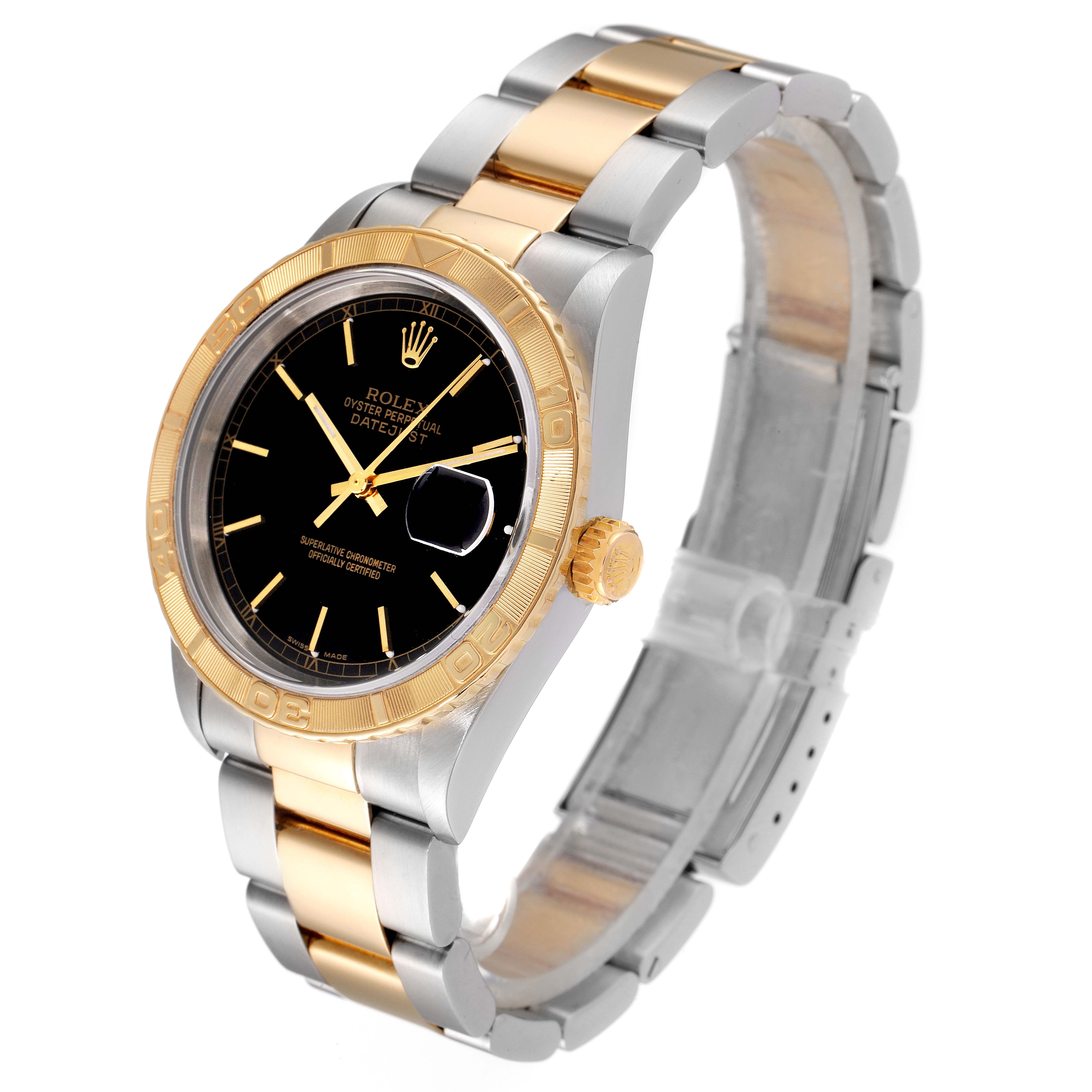This image shows a Rolex Turn-o-Graph 16263 Men
s Stainless Steel Black Dial 16263 Men
s Stainless Steel Black Dial watch from an angled side view, highlighting its black dial, gold bezel, and two-tone bracelet.