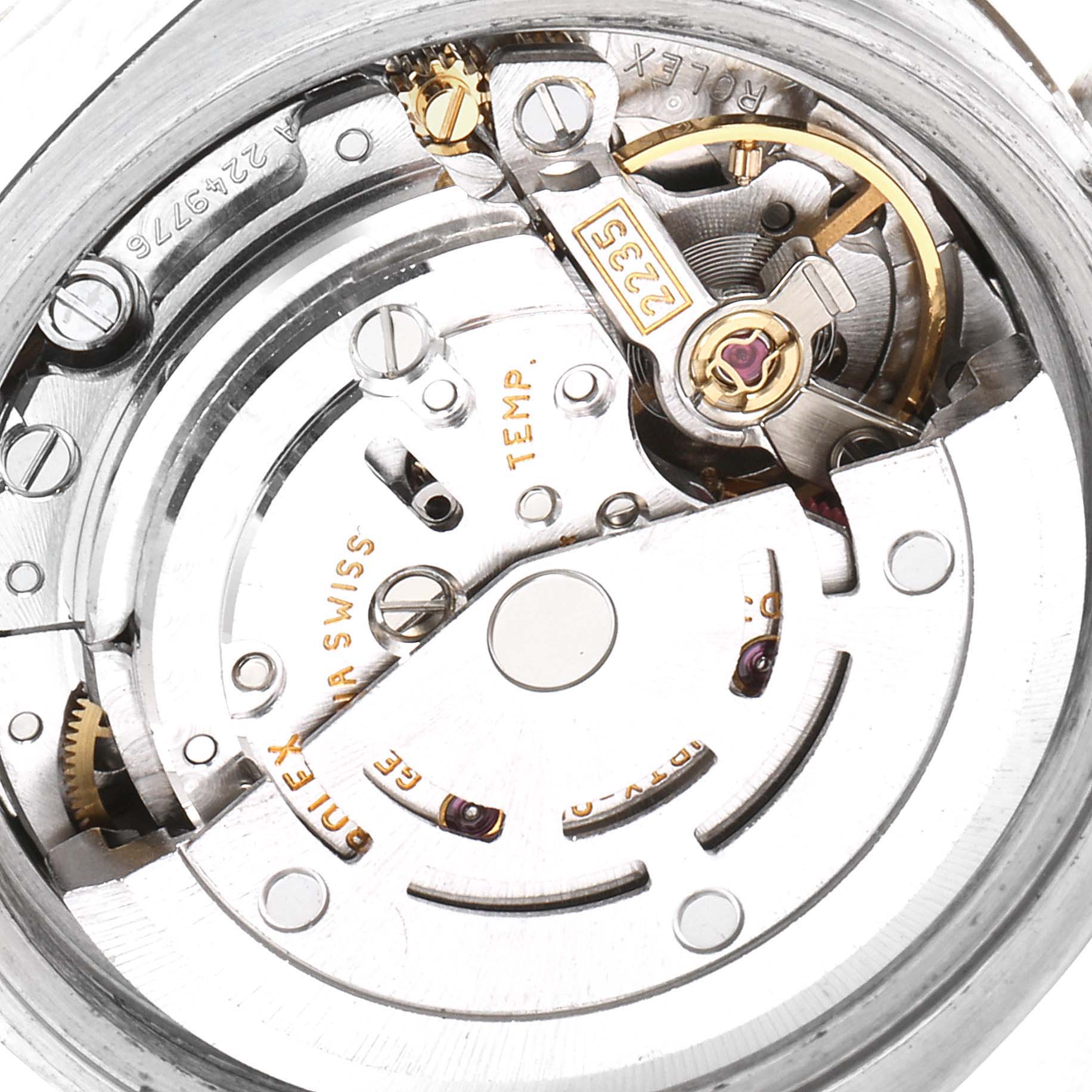 This image shows a close-up of the movement inside a Rolex Datejust 179161 Women's Rose Gold Pink Dial 179161 Women's Rose Gold Pink Dial watch.