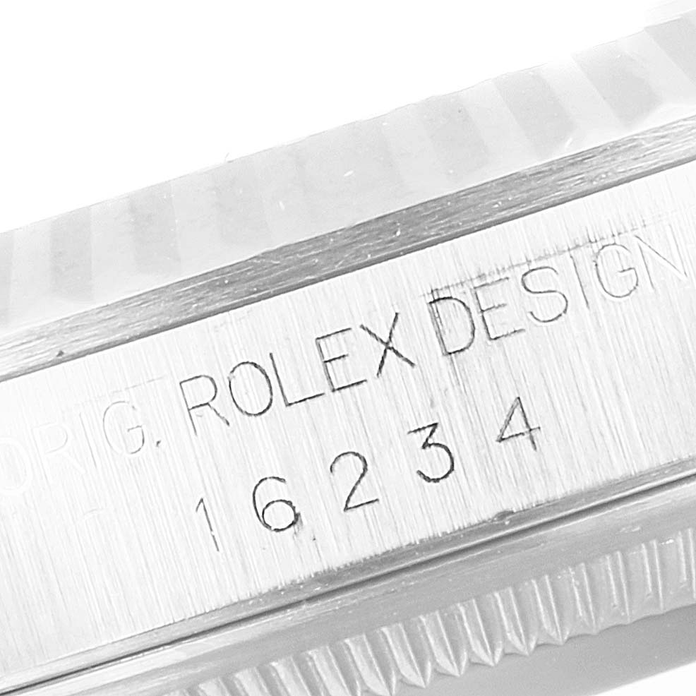 The image shows a close-up of the engraved model number "16234" on a Datejust Rolex watch bezel.