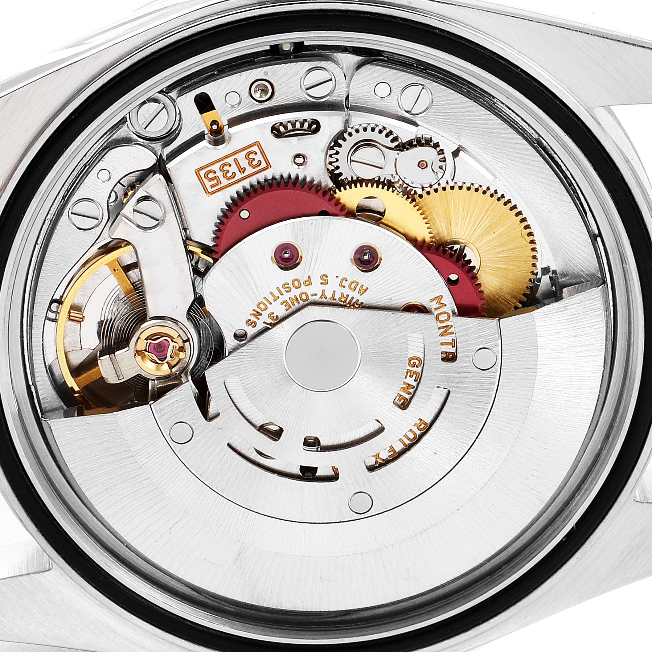 This image shows a close-up view of the movement inside a Rolex Datejust 16234 Men's Stainless Steel Silver Dial 16234 Men's Stainless Steel Silver Dial watch, highlighting the intricate gears and mechanism.