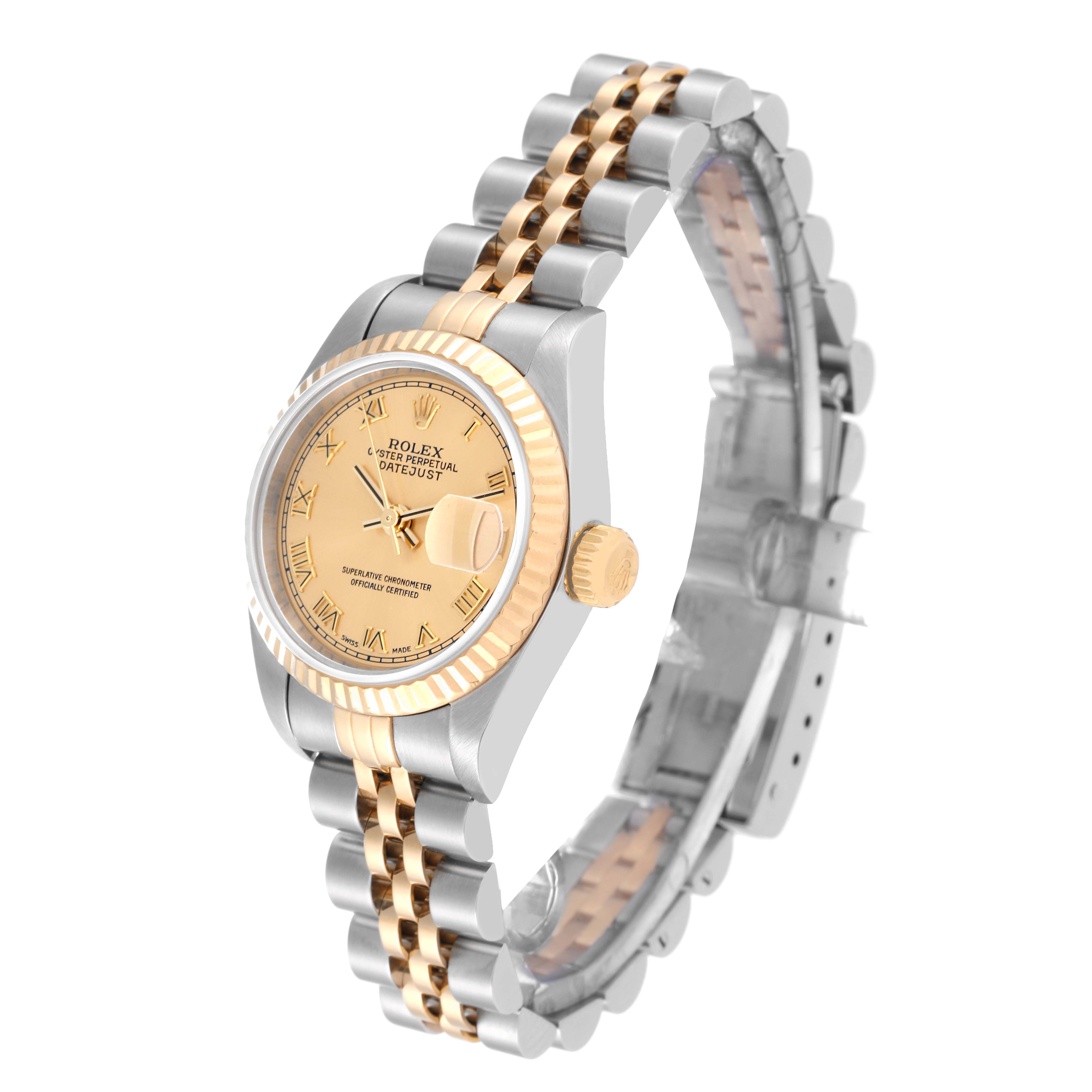 The Rolex Datejust 79173 Women's Steel and Gold (two tone) Champagne Dial 79173 Women's Steel and Gold (two tone) Champagne Dial watch is shown at a slight angle, highlighting its face, bezel, crown, and two-tone bracelet.