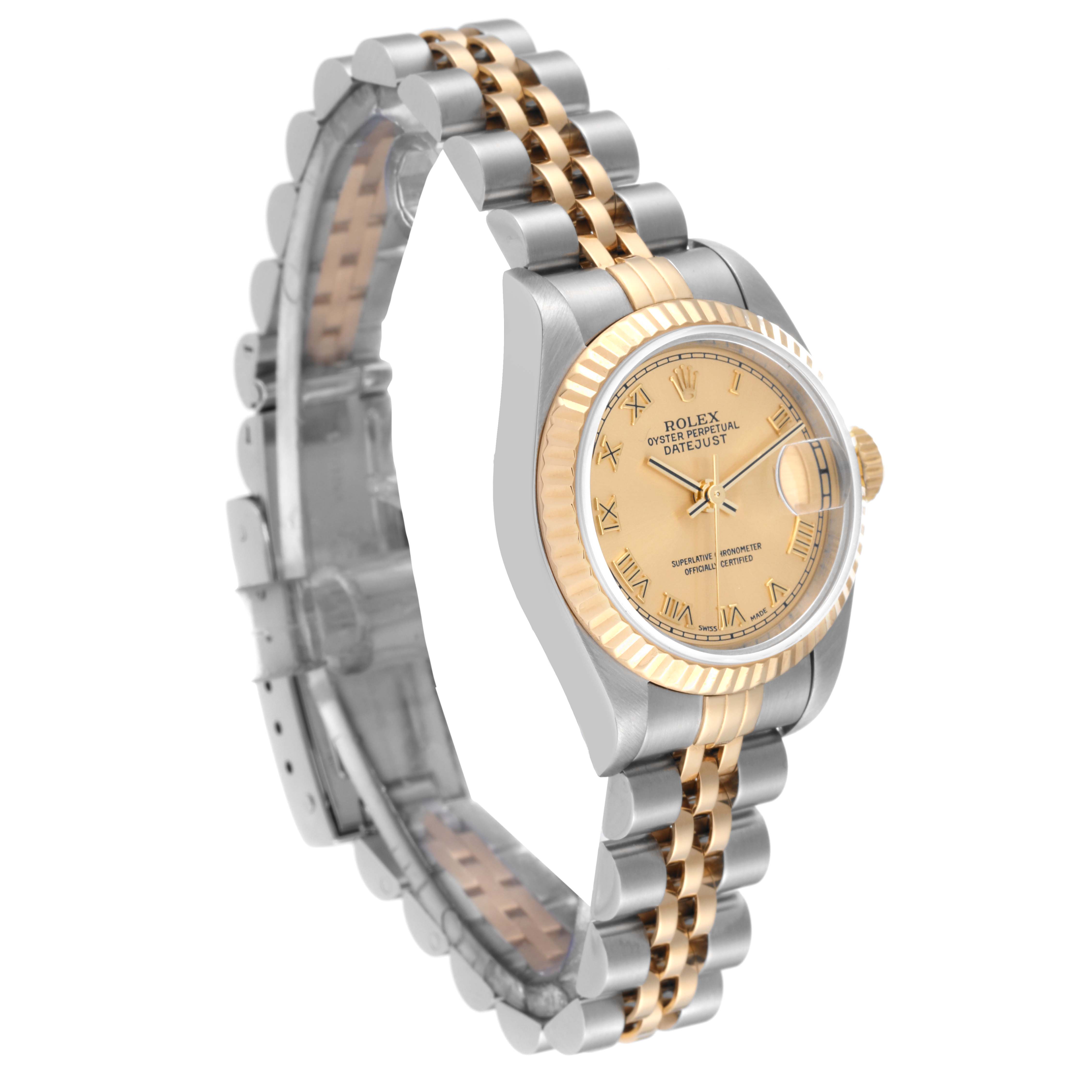 The Rolex Datejust 79173 Women's Steel and Gold (two tone) Champagne Dial 79173 Women's Steel and Gold (two tone) Champagne Dial watch is shown at a three-quarter angle highlighting its gold and silver bracelet, yellow gold fluted bezel, and champagne dial.