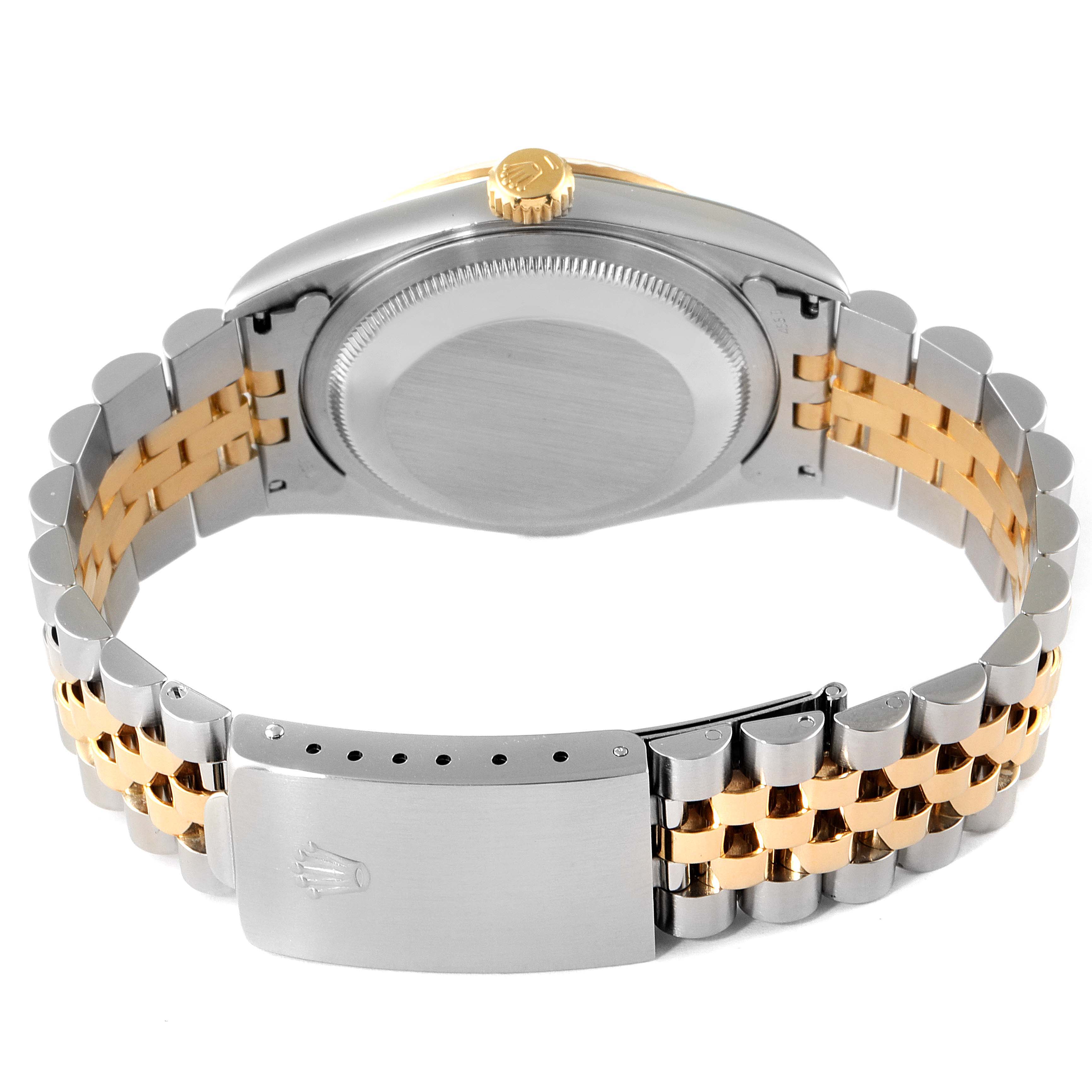 This image shows the back view of a Rolex Datejust 16233 Men's Steel and Gold (two tone) Champagne Dial 16233 Men's Steel and Gold (two tone) Champagne Dial watch, highlighting the case back, crown, and two-tone Jubilee bracelet and clasp.