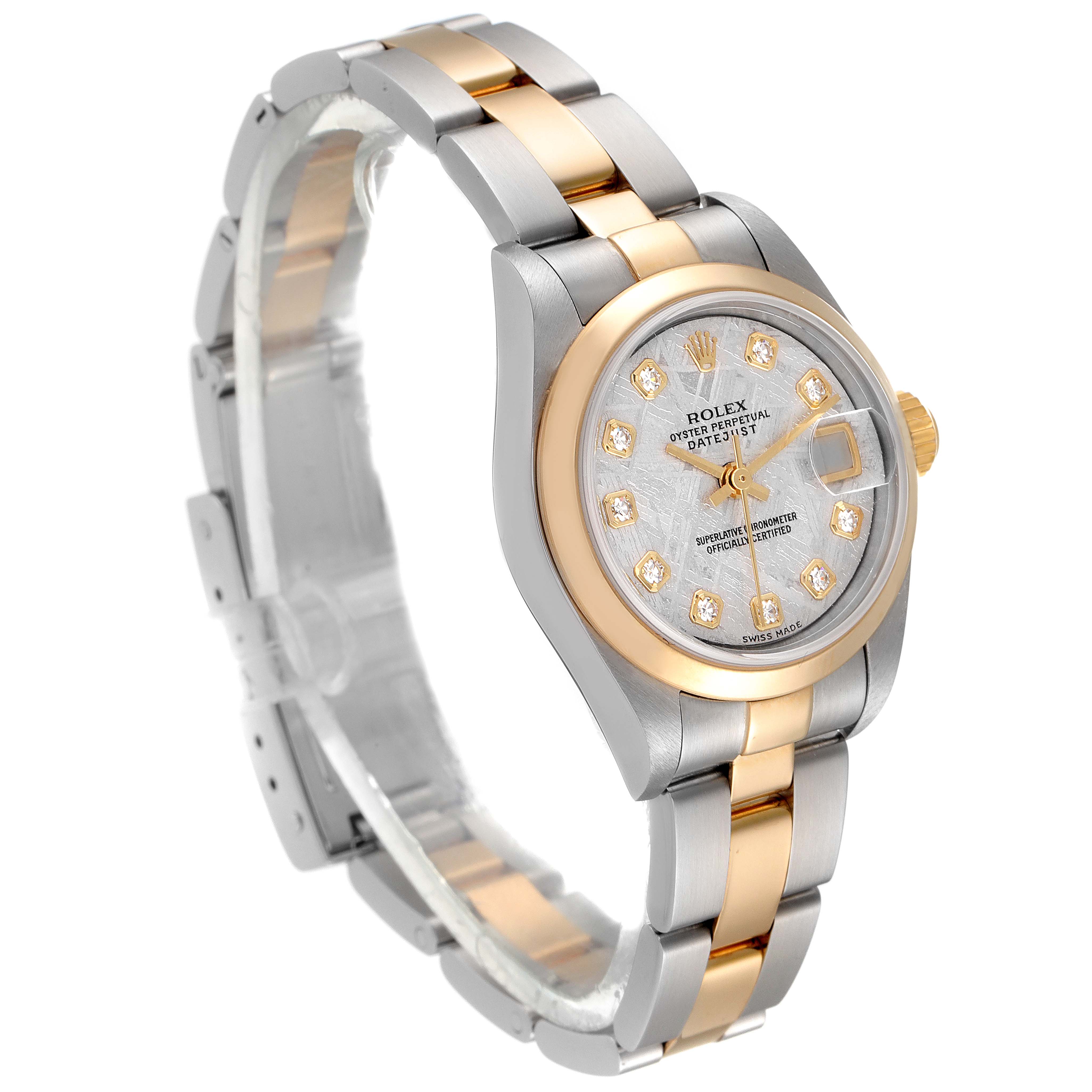 This image shows a Rolex Datejust 79163 Women
s Steel and Gold (two tone) Silver Dial 79163 Women
s Steel and Gold (two tone) Silver Dial watch at an angle highlighting the dial, bezel, and part of the bracelet.