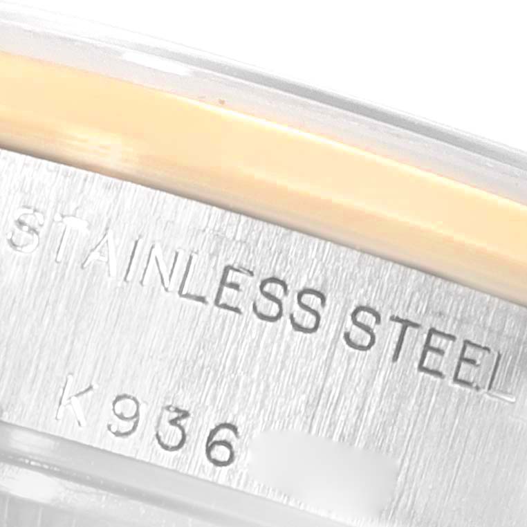 This image shows a close-up of the case side with the engraving "STAINLESS STEEL" on a Rolex Datejust 79163 Women
s Steel and Gold (two tone) Silver Dial 79163 Women
s Steel and Gold (two tone) Silver Dial watch.