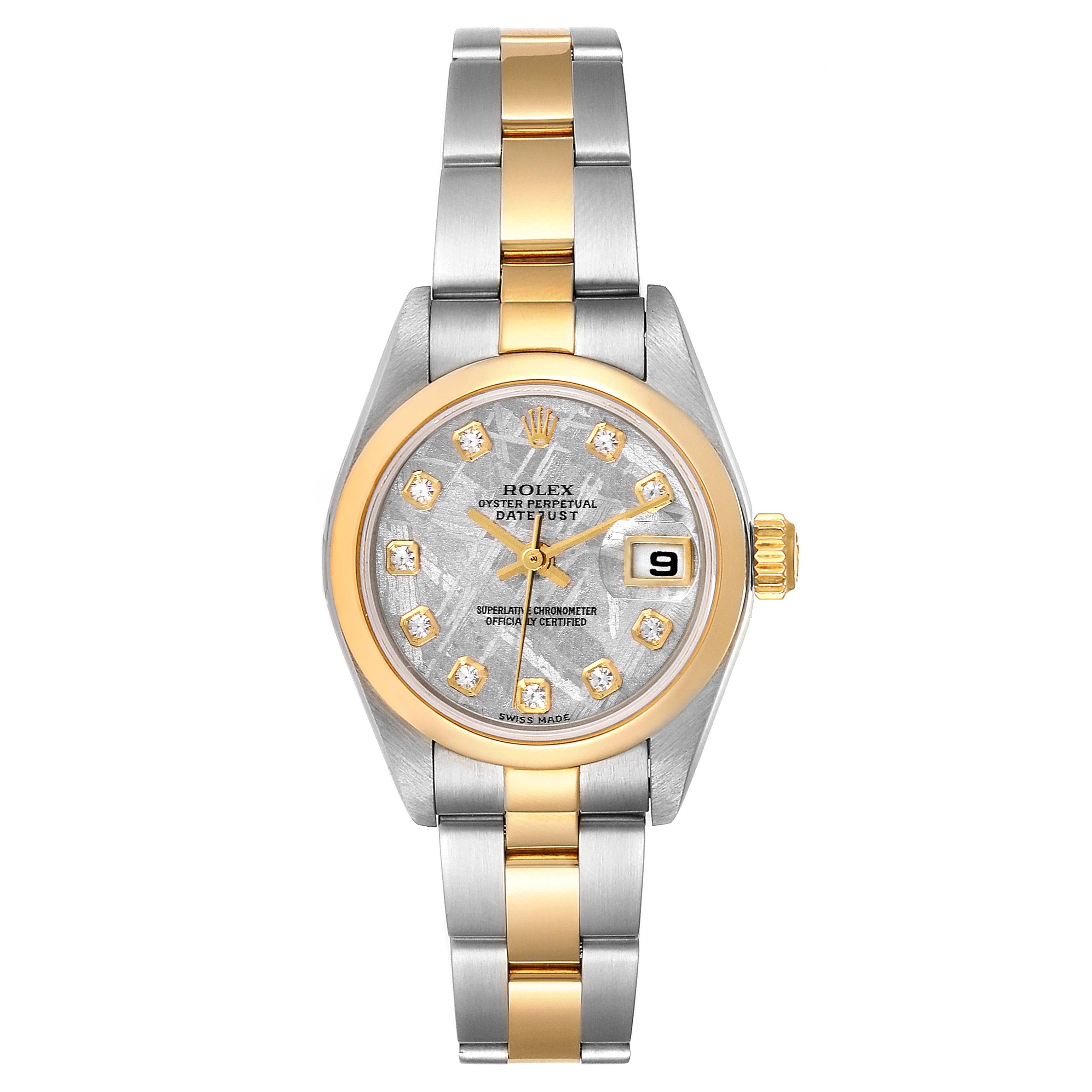 This Rolex Datejust 79163 Women
s Steel and Gold (two tone) Silver Dial 79163 Women
s Steel and Gold (two tone) Silver Dial watch features a front view, highlighting its two-tone metal band, bezel, face, and date window.