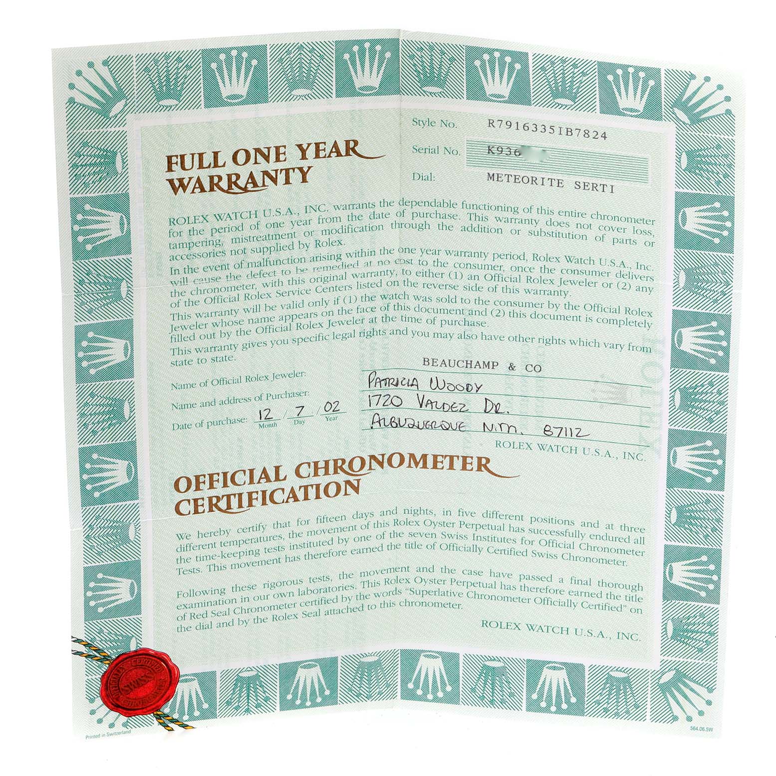 This image shows a one-year warranty certificate and official chronometer certification for a Rolex Datejust 79163 Women
s Steel and Gold (two tone) Silver Dial 79163 Women
s Steel and Gold (two tone) Silver Dial watch.
