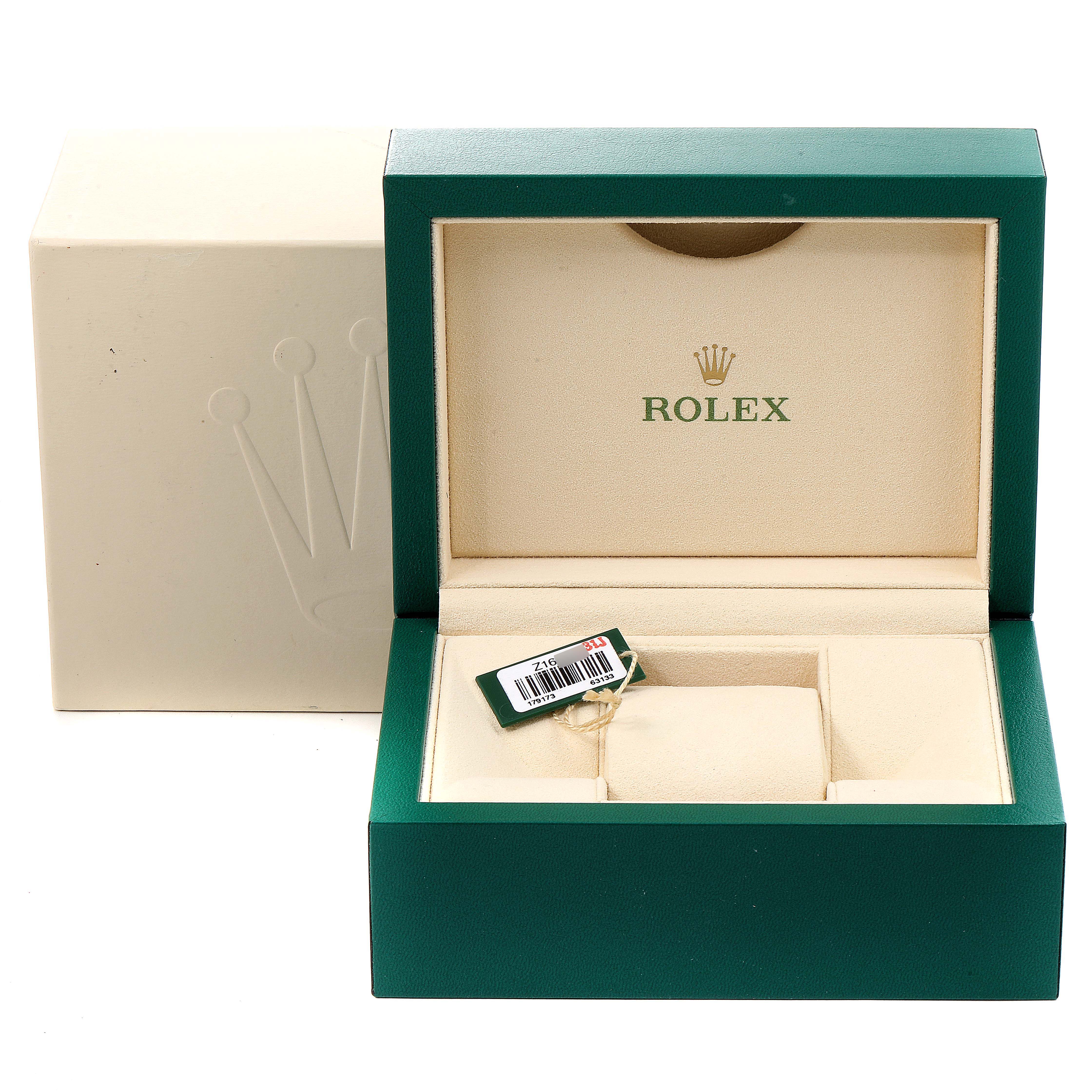 The image shows an open Rolex Datejust 179173 Women's Steel and Gold (two tone) Mother of Pearl Dial 179173 Women's Steel and Gold (two tone) Mother of Pearl Dial watch box with an empty cushion and a tag inside.