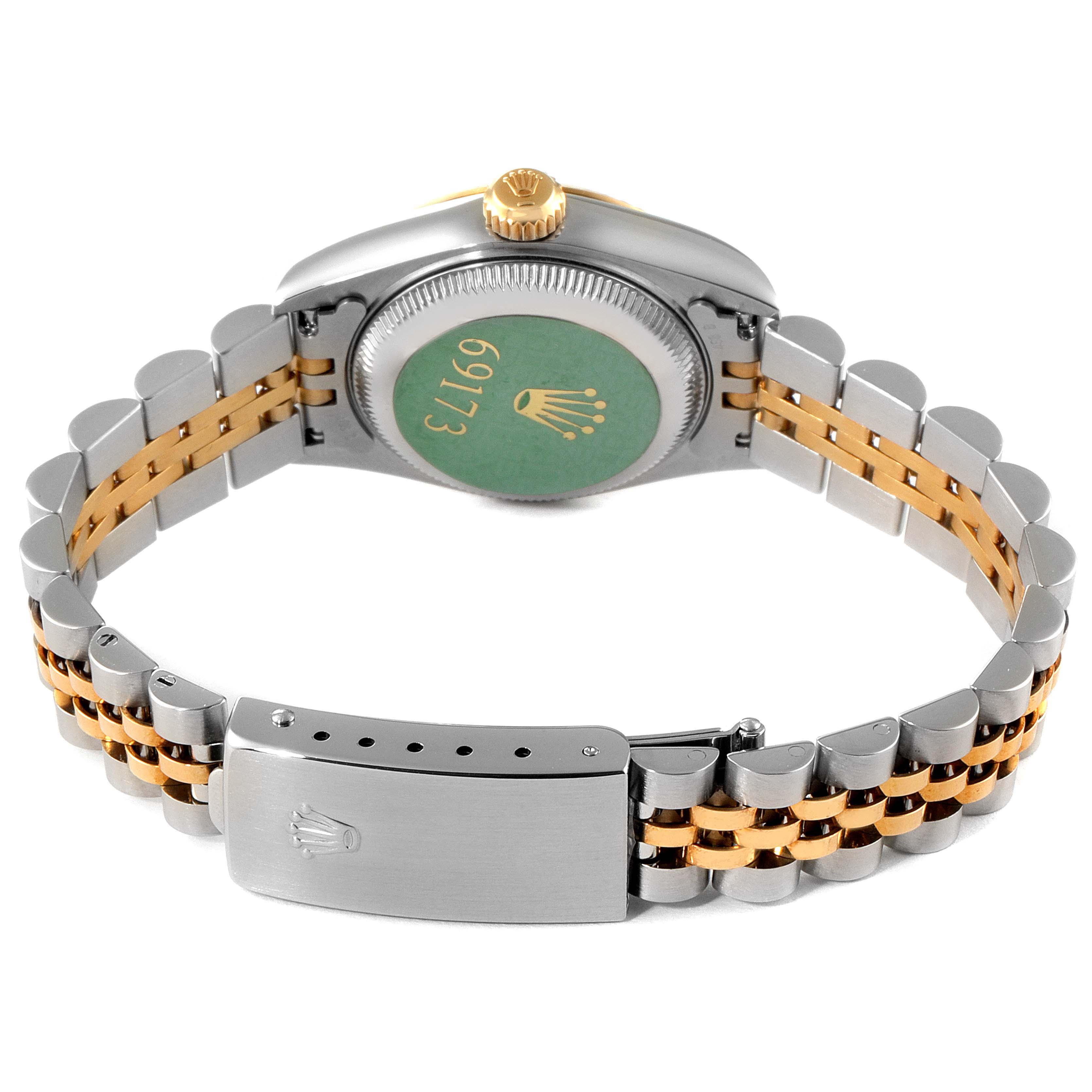 The image shows the back of a Rolex Datejust 69173 Women's Steel and Gold (two tone) Grey Dial 69173 Women's Steel and Gold (two tone) Grey Dial watch, highlighting its case back, bracelet, and clasp.