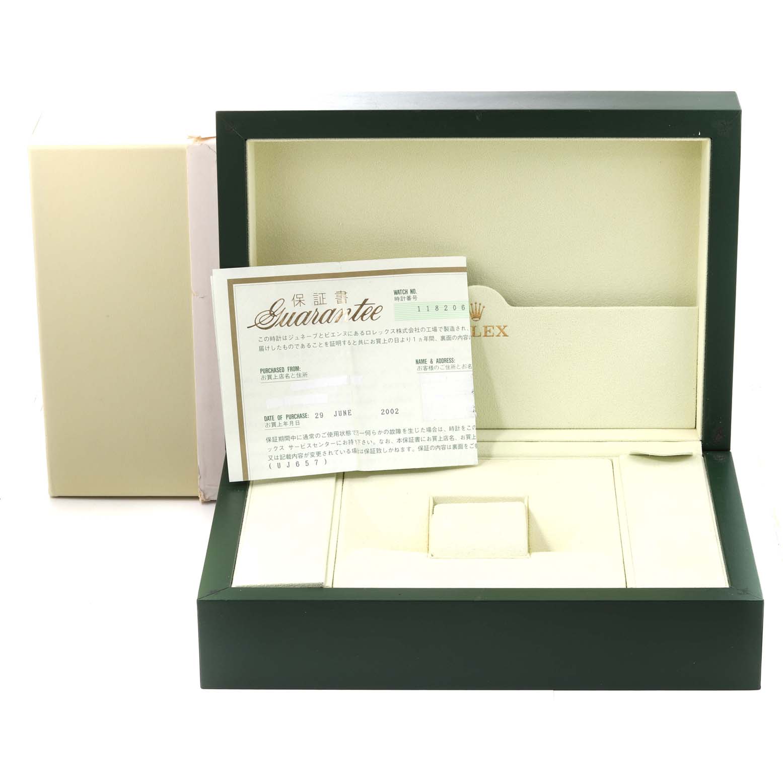 The image shows an empty Rolex watch box with a warranty card, presumably for a President model, displayed frontally.