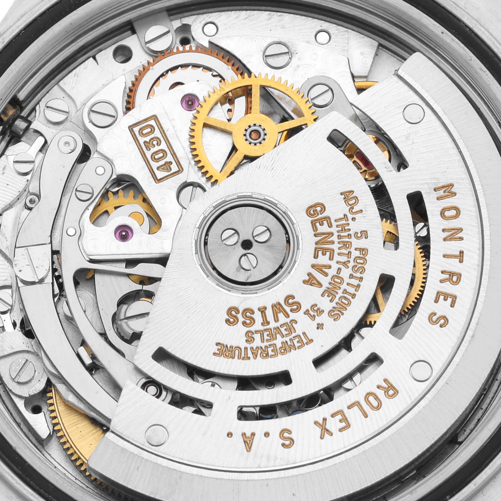 This image shows the intricate internal mechanical movement of a Rolex Daytona 16523 Men's Steel and Gold (two tone) Champagne Dial 16523 Men's Steel and Gold (two tone) Champagne Dial watch viewed from the back.