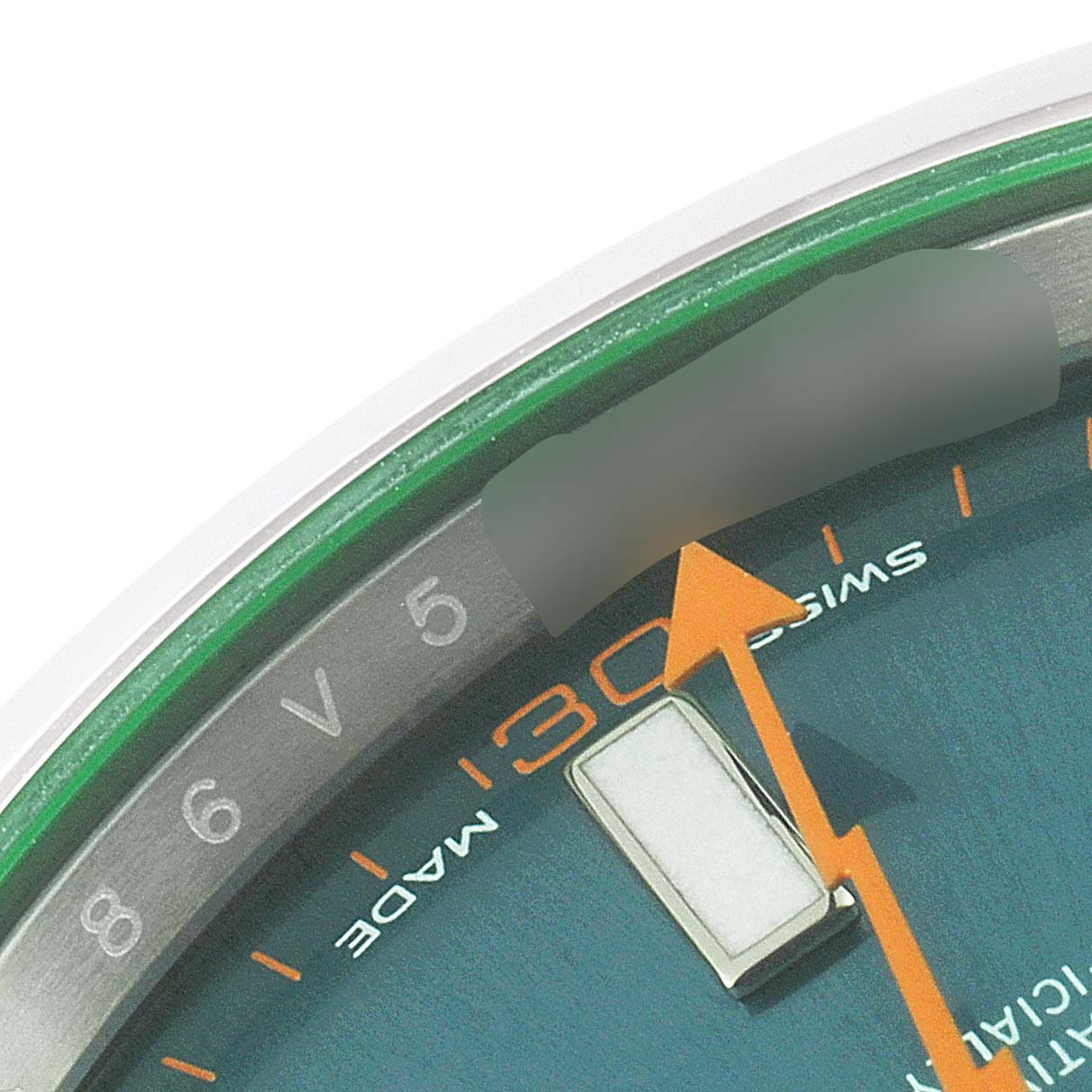 The image shows a close-up of the dial and orange second hand of the Rolex Milgauss 116400GV Men's Stainless Steel Blue Dial 116400GV Men's Stainless Steel Blue Dial watch, including the minute markers and Swiss Made text.