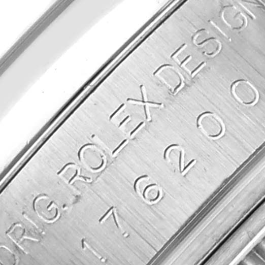 The image shows a close-up of the engraved text on the side of a Rolex Oyster Perpetual 176200 Women's Stainless Steel Pink Dial 176200 Women's Stainless Steel Pink Dial watch case.