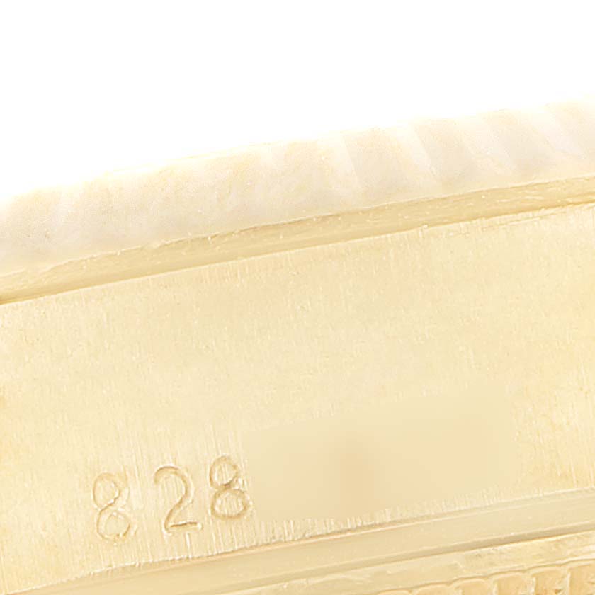 This close-up angle of the Rolex President 69178 Women's Yellow Gold Beige Dial 69178 Women's Yellow Gold Beige Dial watch highlights the model number engraving on the side.
