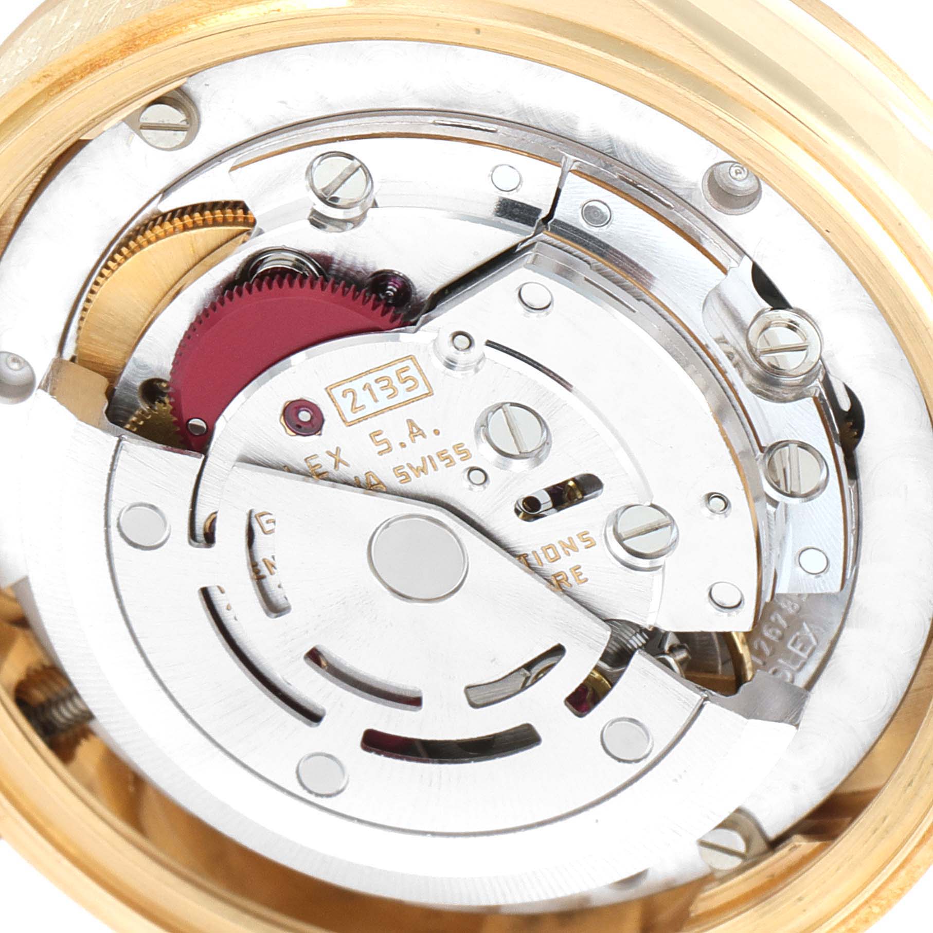 The image shows the internal mechanism of a Rolex President 68278 Women
s Yellow Gold Champagne Dial 68278 Women
s Yellow Gold Champagne Dial model watch, highlighting its movement and components from a top-down angle.