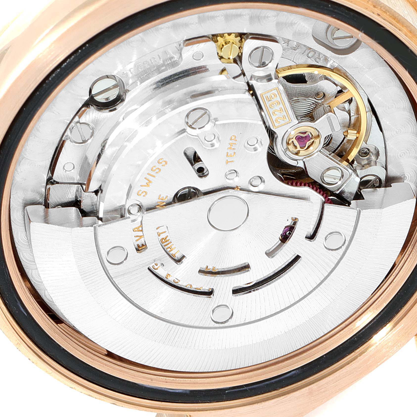 This close-up image shows the inner mechanical movement of a Rolex President 178275 Women's Rose Gold Silver Dial 178275 Women's Rose Gold Silver Dial model watch.