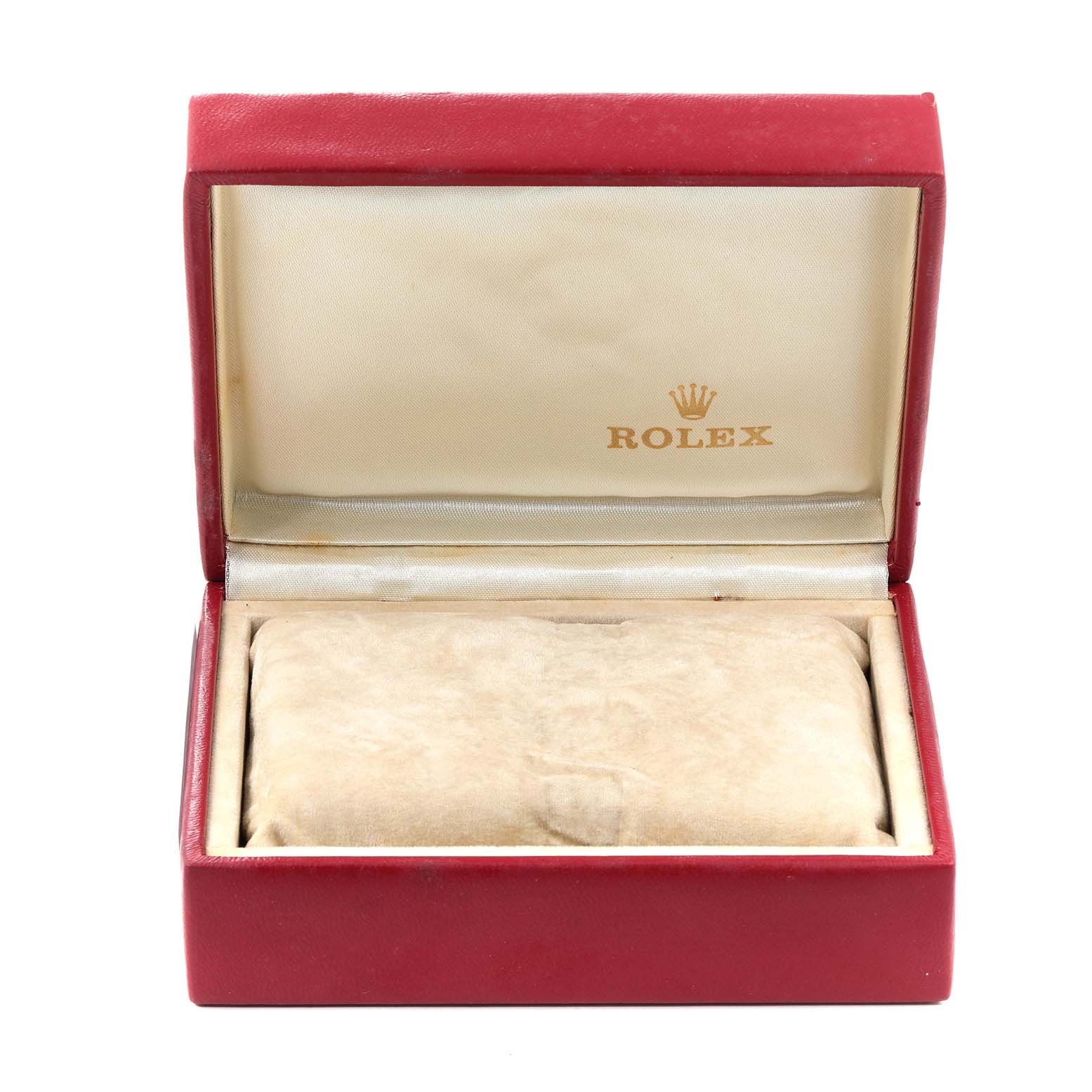 The image shows an open red Rolex watch box for the President model, containing a cushioned section without the watch visible.
