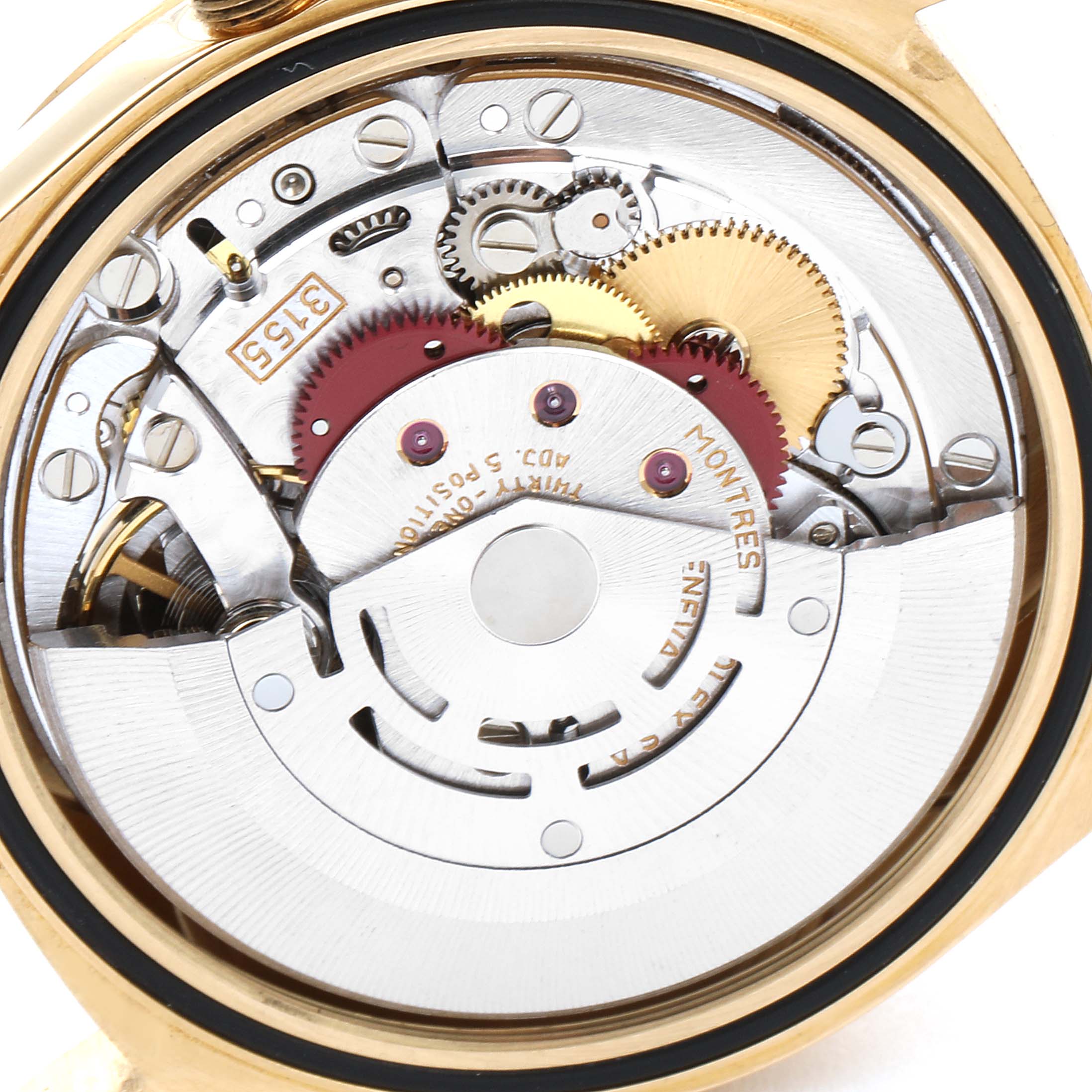 The image shows the inner mechanical movements and components of a Rolex President 18238 Men's Yellow Gold Champagne Dial 18238 Men's Yellow Gold Champagne Dial model watch, viewed from the back.