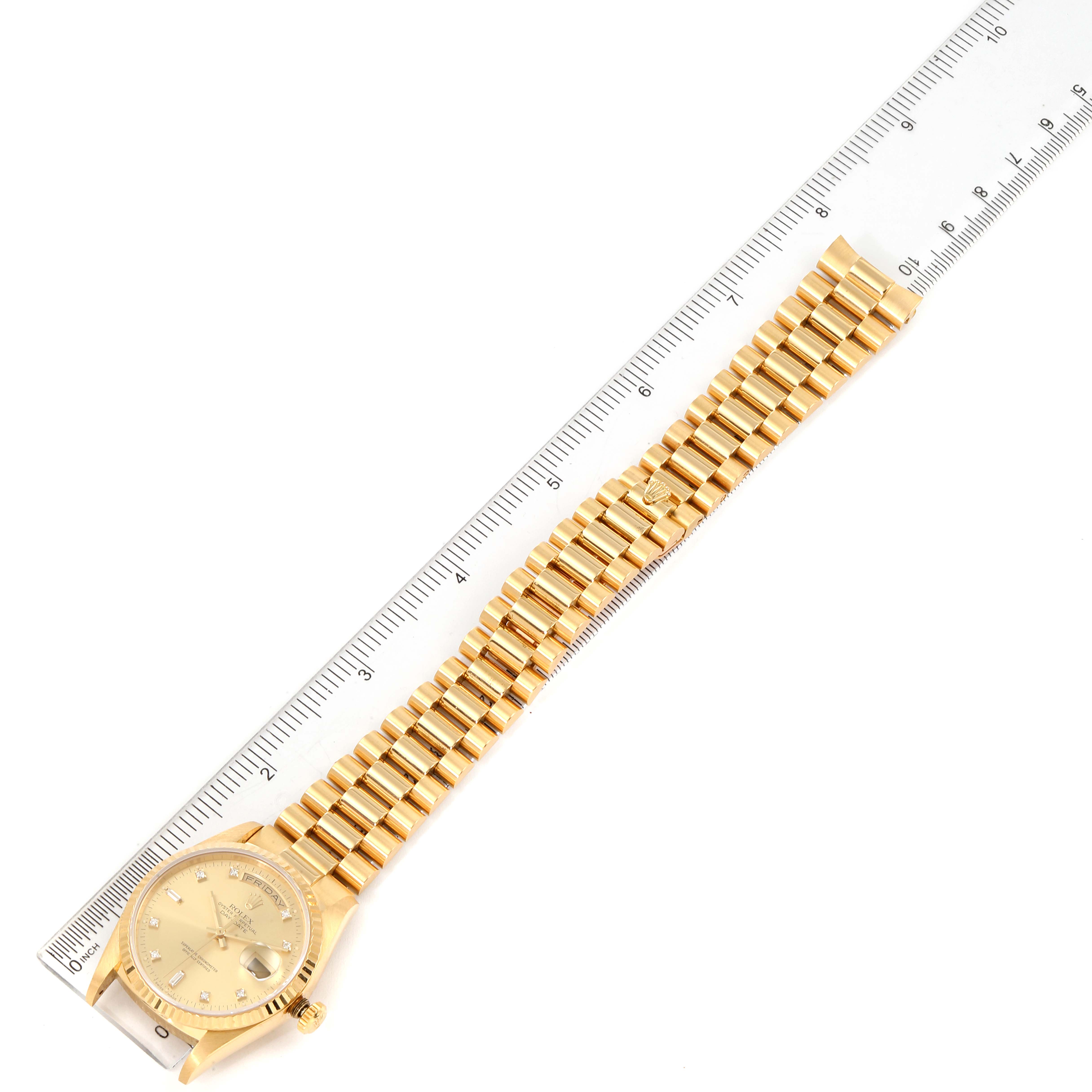 The Rolex President 18238 Men's Yellow Gold Champagne Dial 18238 Men's Yellow Gold Champagne Dial model watch is shown flat, displaying the face, bezel, case, and full gold bracelet.