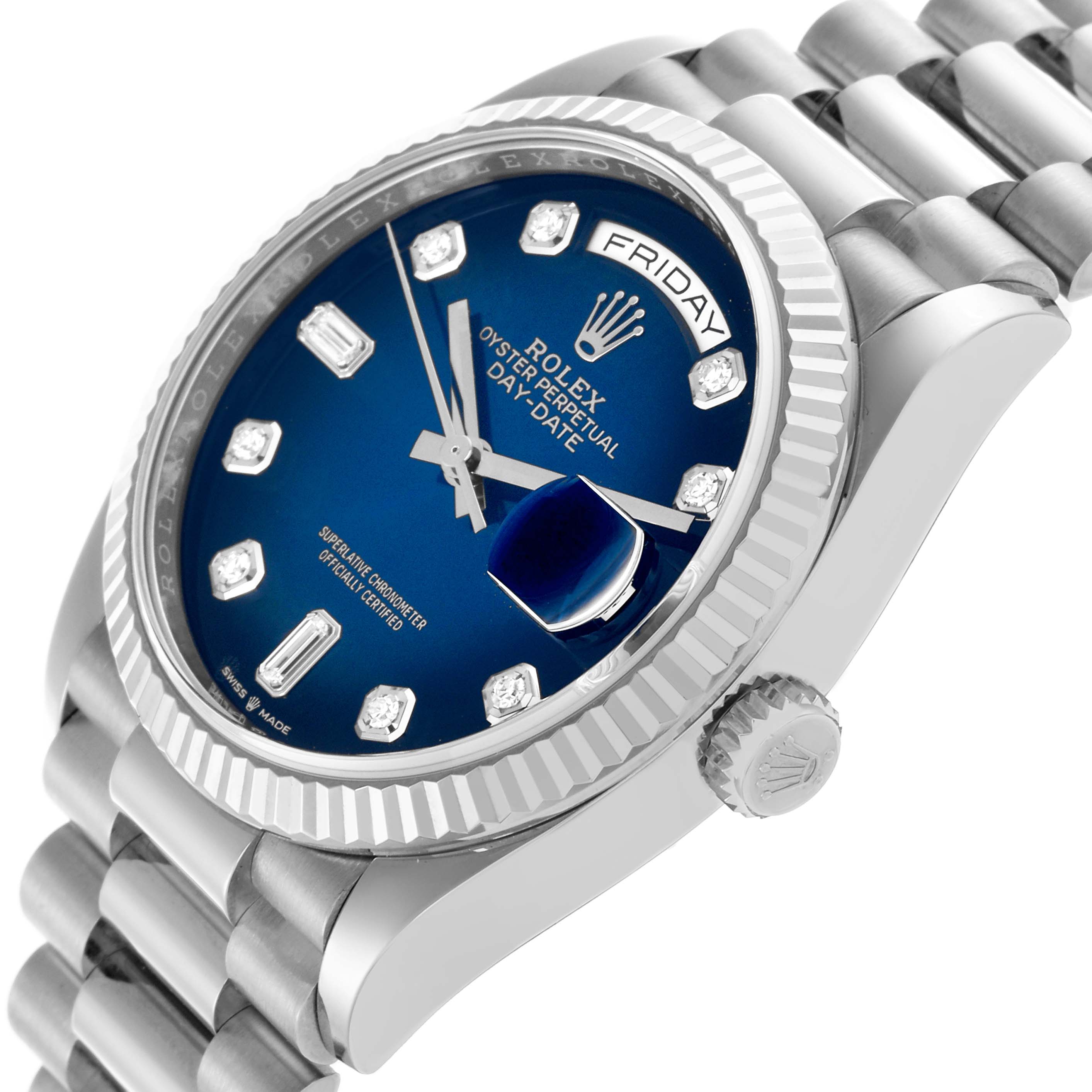 The Rolex President 128239 Men's White Gold Blue Dial 128239 Men's White Gold Blue Dial model is shown at an angle highlighting the blue dial, diamond hour markers, bezel, crown, and bracelet links.
