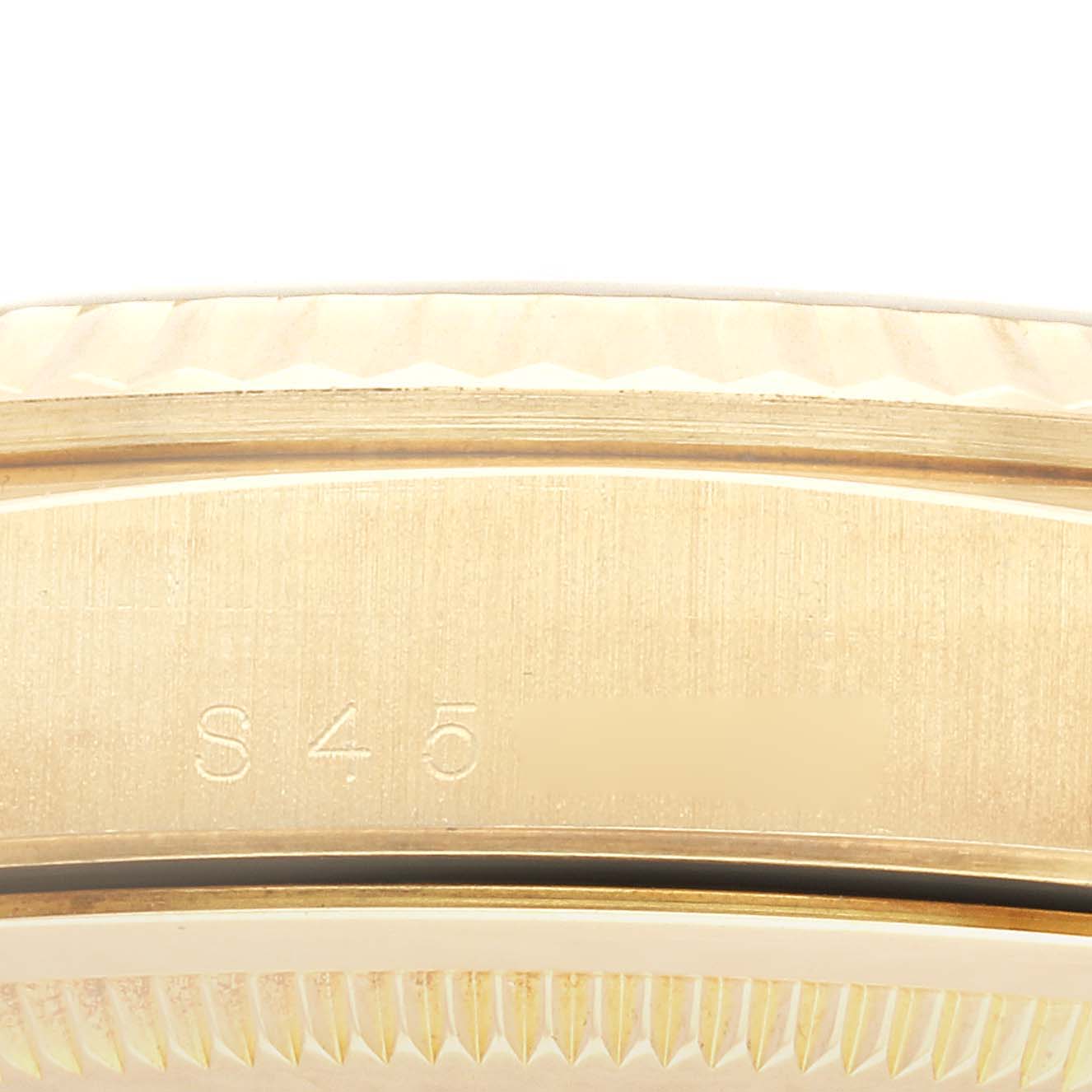 This image shows a close-up view of the side casing and bezel of a Rolex President 18238 Men
s Yellow Gold Champagne Dial 18238 Men
s Yellow Gold Champagne Dial model watch.