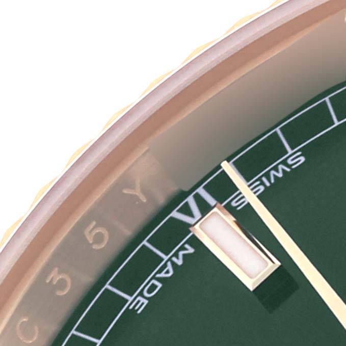 The image shows a close-up of the dial and rehaut of the Rolex President 118138 Men's Yellow Gold Green Dial 118138 Men's Yellow Gold Green Dial watch, highlighting the indices and part of the bezel.