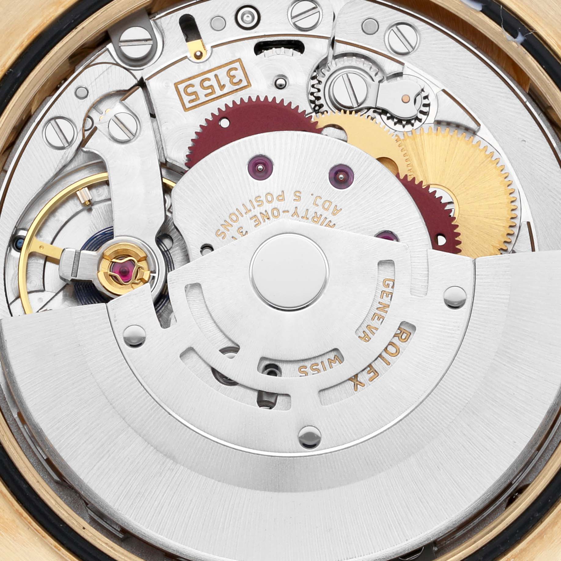 The image shows a close-up of the Rolex President 118138 Men's Yellow Gold Green Dial 118138 Men's Yellow Gold Green Dial model's movement mechanism, highlighting gears and components.