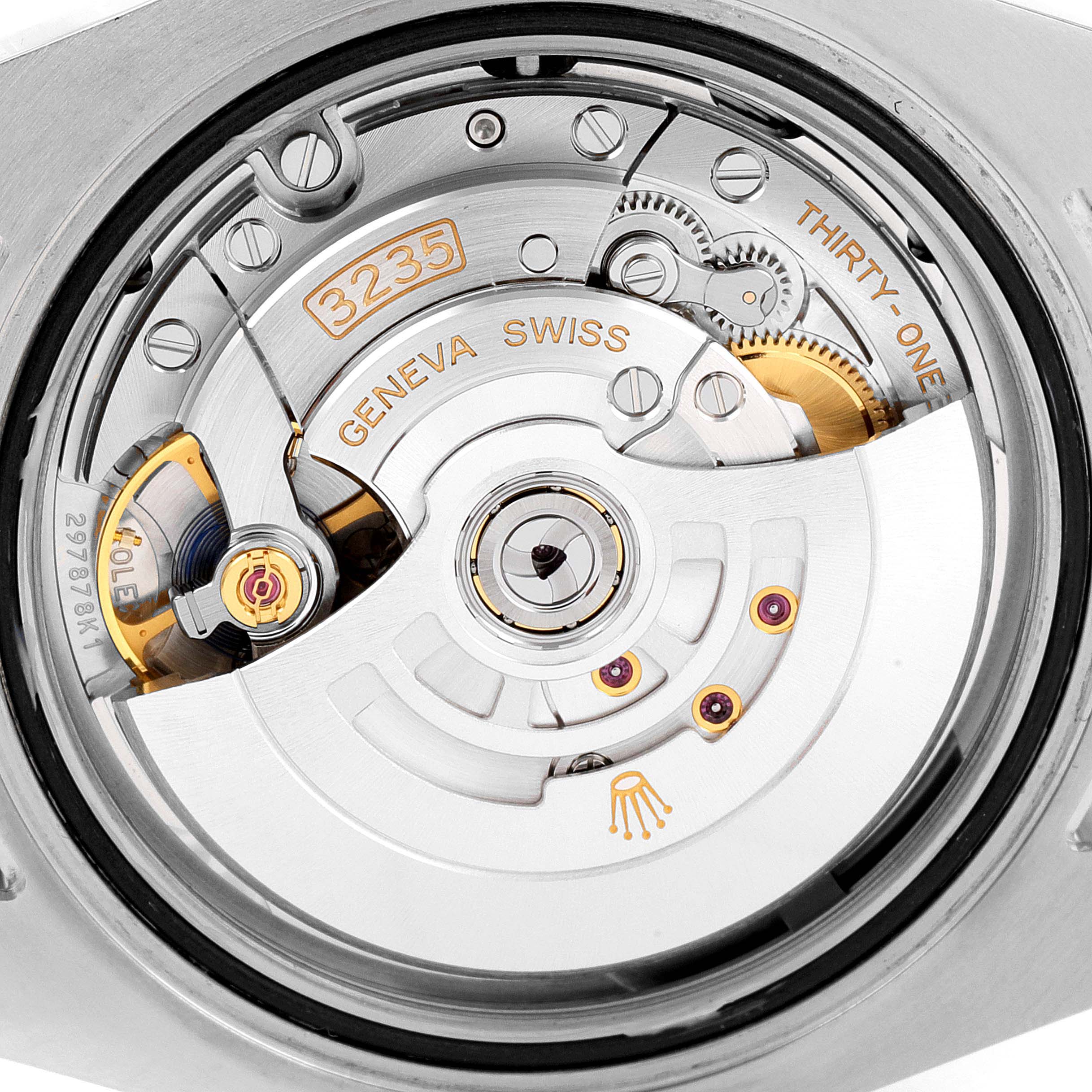 The image shows the internal movement of a Rolex Submariner 126613 Men's Steel and Gold (two tone) Black Dial 126613 Men's Steel and Gold (two tone) Black Dial watch with caliber 3235, featuring gears and mechanisms.