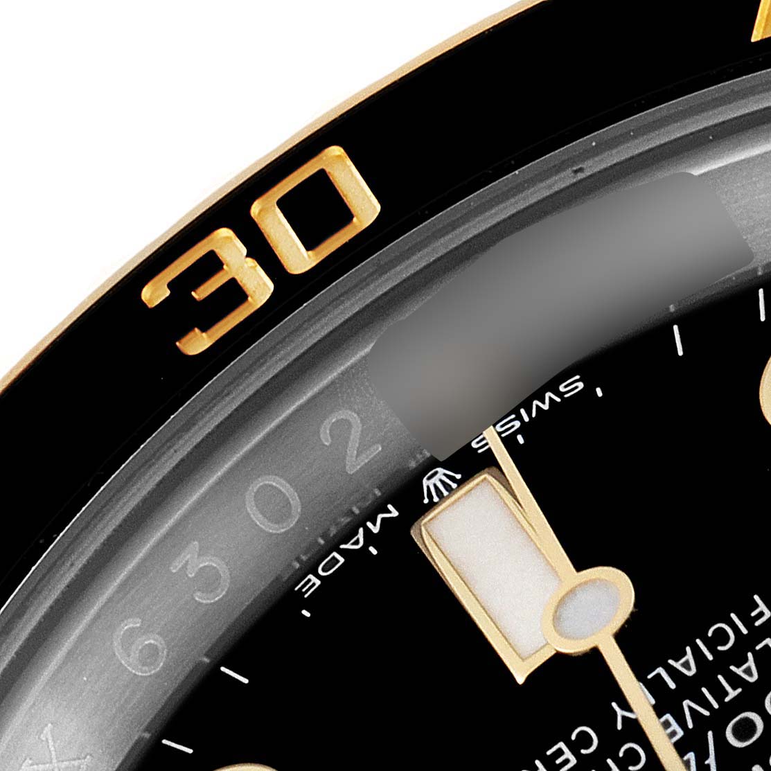 The image shows a close-up of the dial and bezel of a Rolex Submariner 126613 Men's Steel and Gold (two tone) Black Dial 126613 Men's Steel and Gold (two tone) Black Dial, highlighting the 30-minute mark.